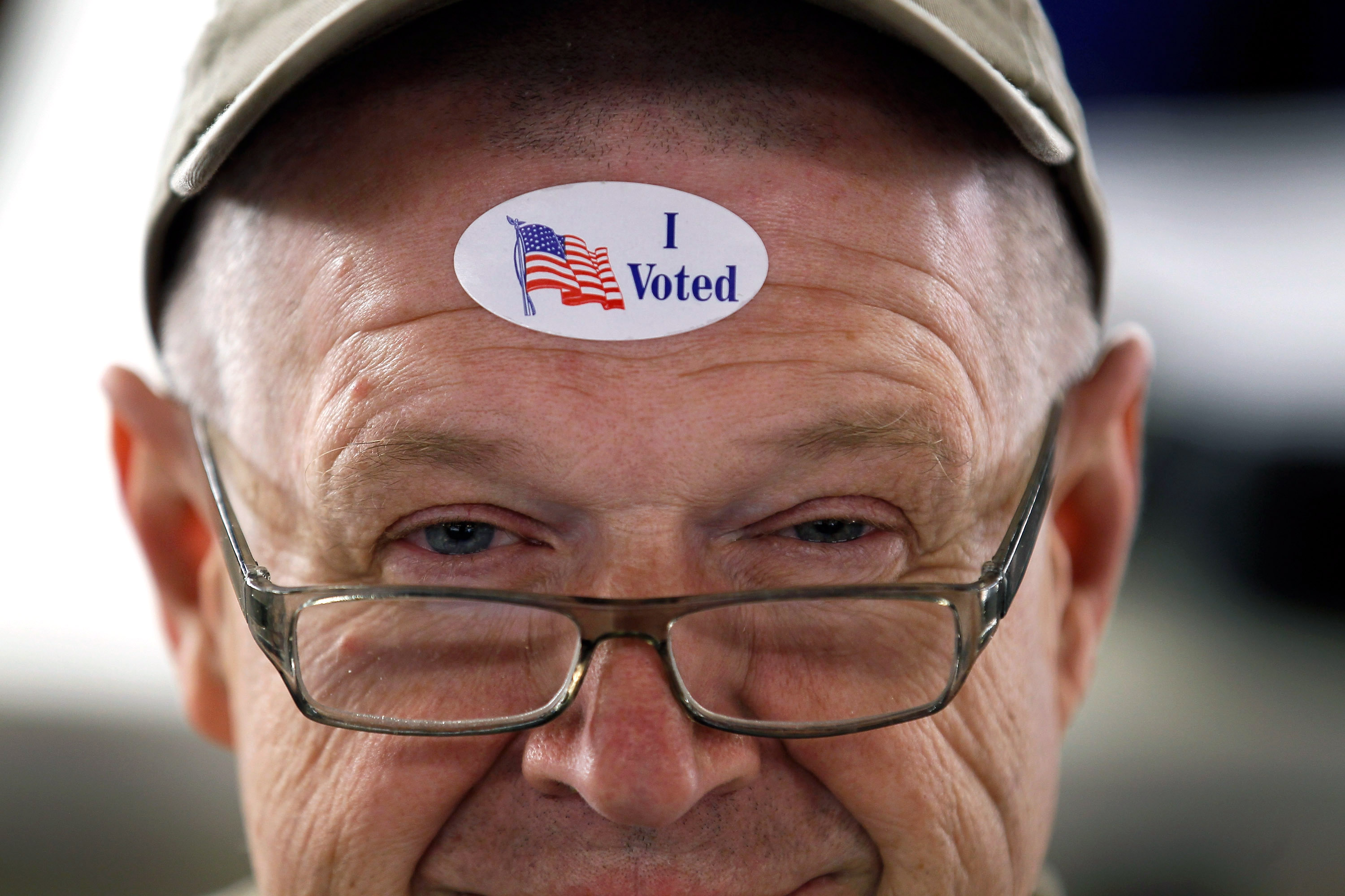 A voter wears his "I Voted" sticker after voting in the GOP Presidential primary in Royal Oak, Michigan February 28, 2012. CREDIT: Joe Raedle/Getty Images