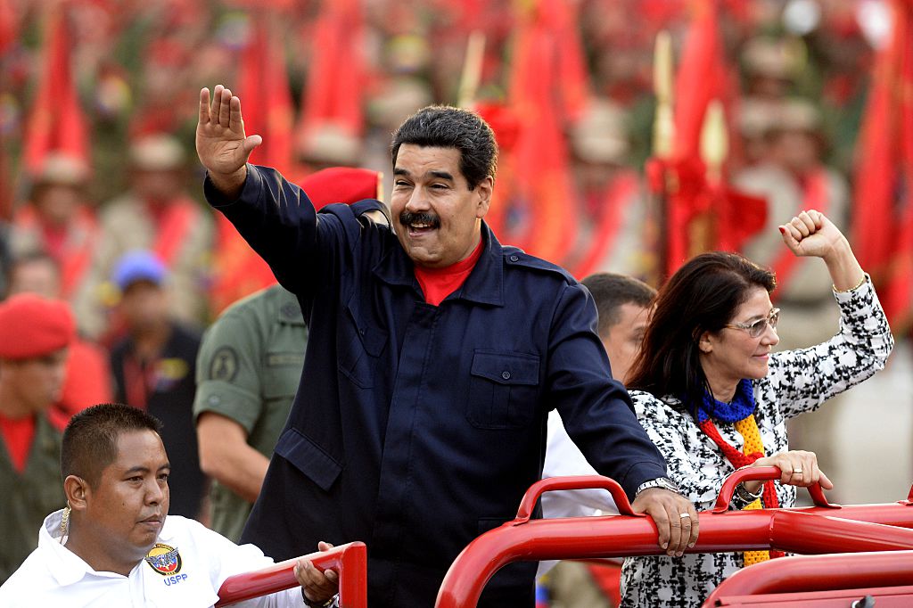 Venezuelan President Nicolas Maduro is being investigated by American authorities for his role in a billion-dollar money-laundering scheme reaching from Venezuela to Florida. CREDIT: FEDERICO PARRA / GETTY