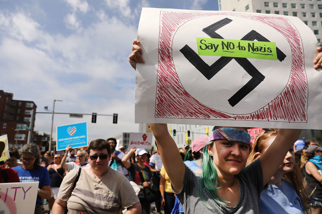 Thousands of protesters march in Boston against a planned 'Free Speech Rally' just one week after the violent 'Unite the Right' rally in Virginia on August 19, 2017 in Boston, United States. CREDIT: Spencer Platt/Getty Images
