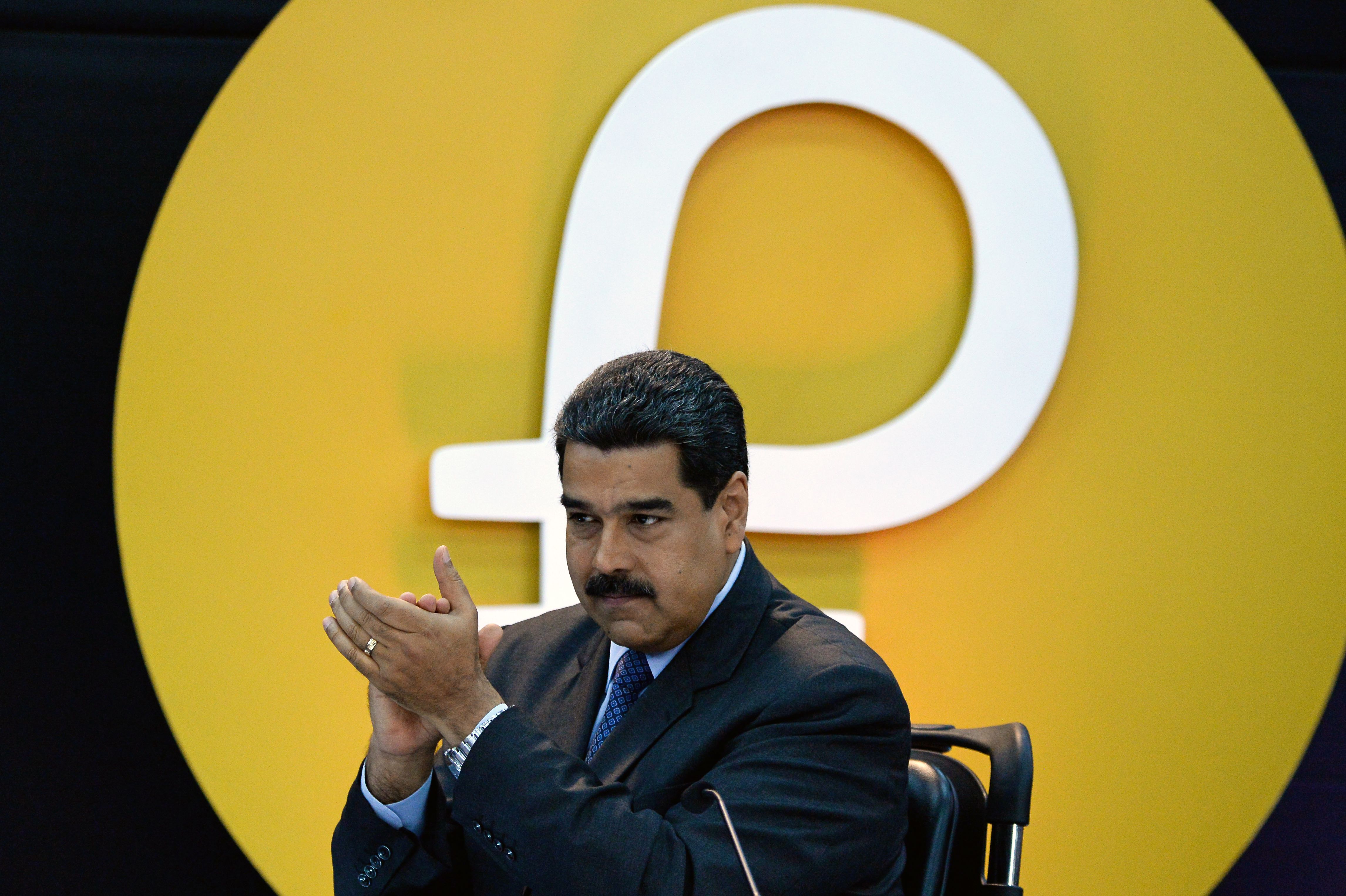 Venezuela's President Nicolas Maduro gestures during a press conference to launch to the market a new oil-backed cryptocurrency called "Petro", at the Miraflores Presidential Palace in Caracas, on February 20, 2018.
CREDIT: Federico Parra/AFP/Getty Images.