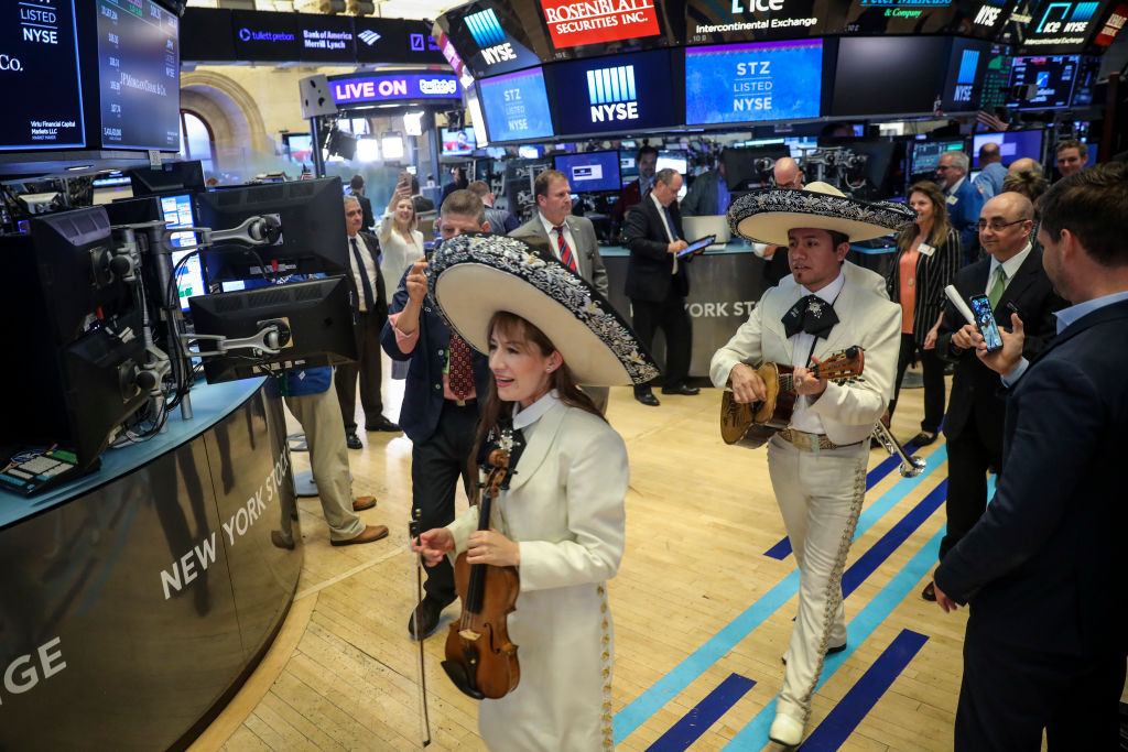 NEW YORK, NY - MAY 4: A mariachi band, on hand to celebrate Cinco de Mayo, performs ahead of the closing bell on the floor of the New York Stock Exchange (NYSE), May 4, 2018 in New York City. (CREDIT: Drew Angerer/Getty Images)