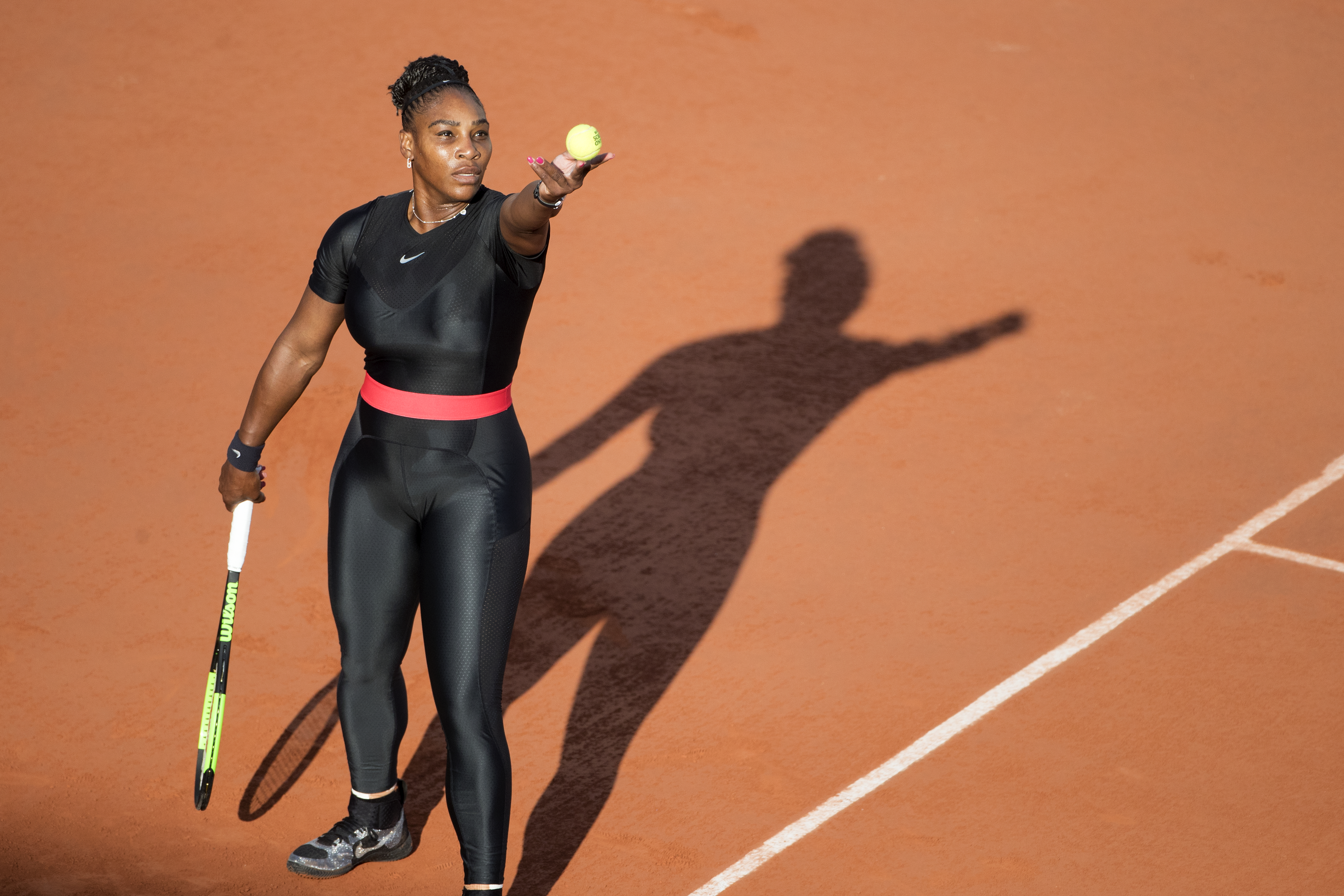 PARIS, FRANCE June 2. French Open Tennis Tournament - Day Seven. Serena Williams of the United States in action against Julia Goerges of Germany in the evening light on Court Suzanne Lenglen in the Women's Singles Competition at the 2018 French Open Tennis Tournament at Roland Garros on June 2nd 2018 in Paris, France. (Photo by Tim Clayton/Corbis via Getty Images)
