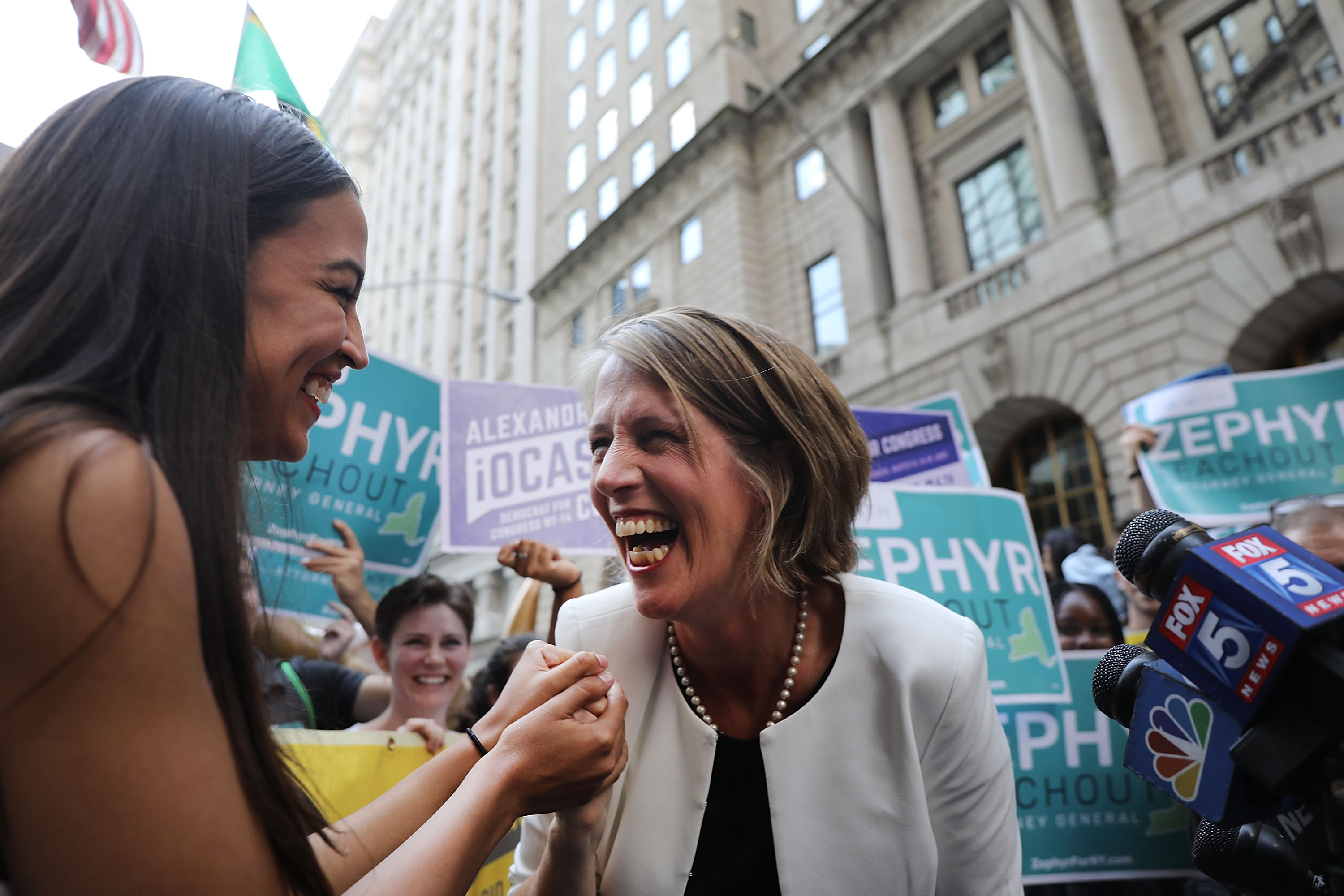 Alexandria Ocasio-Cortez stands with Zephyr Teachout. CREDIT: Spencer Platt/Getty Images