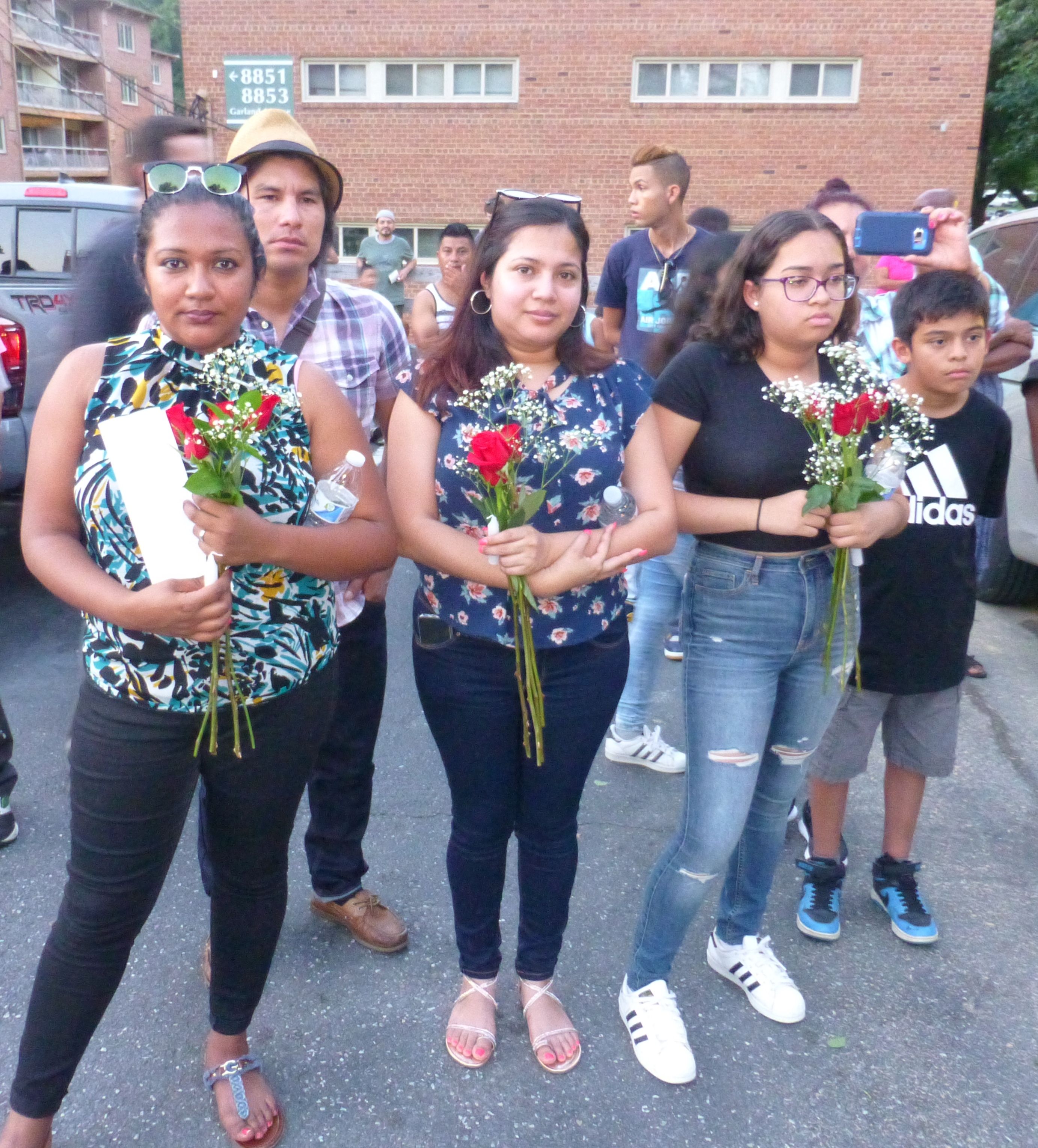 On August 10, 2018, Silver Spring, Maryland residents attend a vigil to commemorate the two-year anniversary of a natural gas explosion that killed seven people at the Flower Branch apartment complex. CREDIT: Mark Hand/ThinkProgress