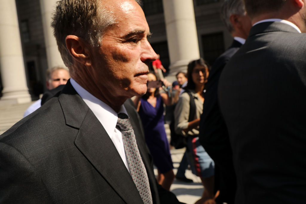 Rep. Chris Collins (R-NY) walks out of a New York court house after being charged with insider trading on August 8, 2018 in New York City. Collins originally said he would fight the charges, but has since suspended his reelection bid. (Photo credit: Spencer Platt/Getty Images)