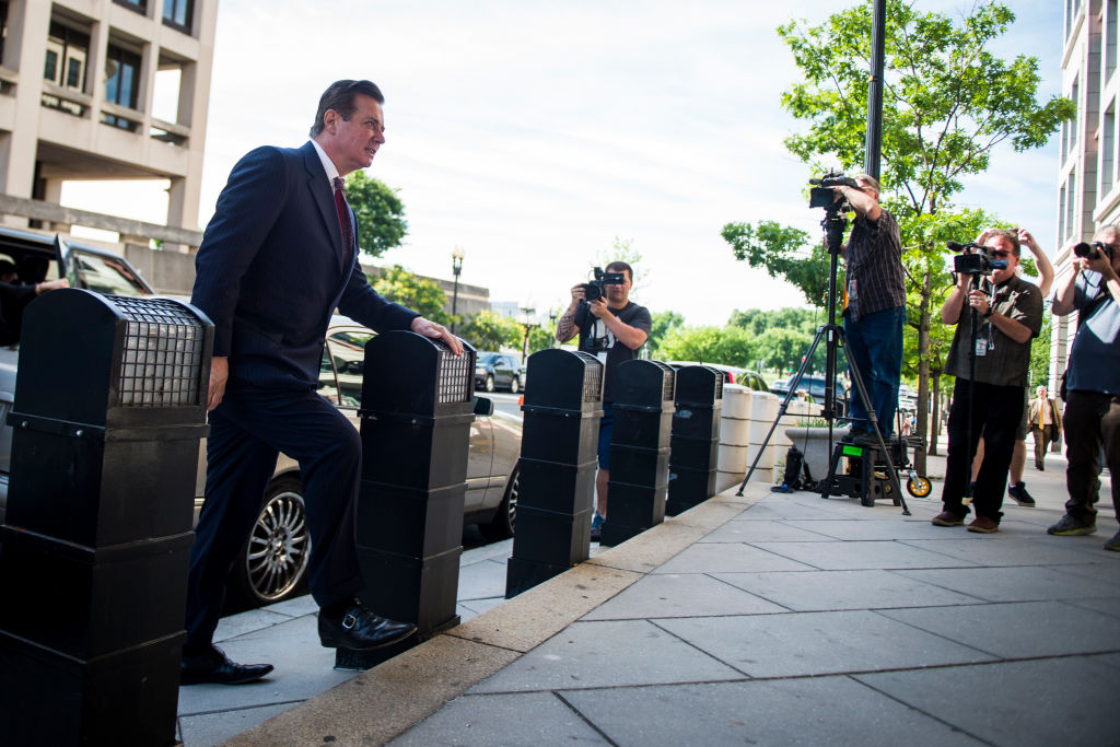President Trump on Wednesday said his former campaign chairman Paul Manafort, who was convicted on multiple counts of fraud this week, was a "brave man" who had been unfairly targeted over a "12 year old tax" issue. But a quick look at Special Counsel Robert Mueller's investigation into Manafort shows that's not exactly the case. (PHOTO CREDIT: Sarah Silbiger/CQ Roll Call)