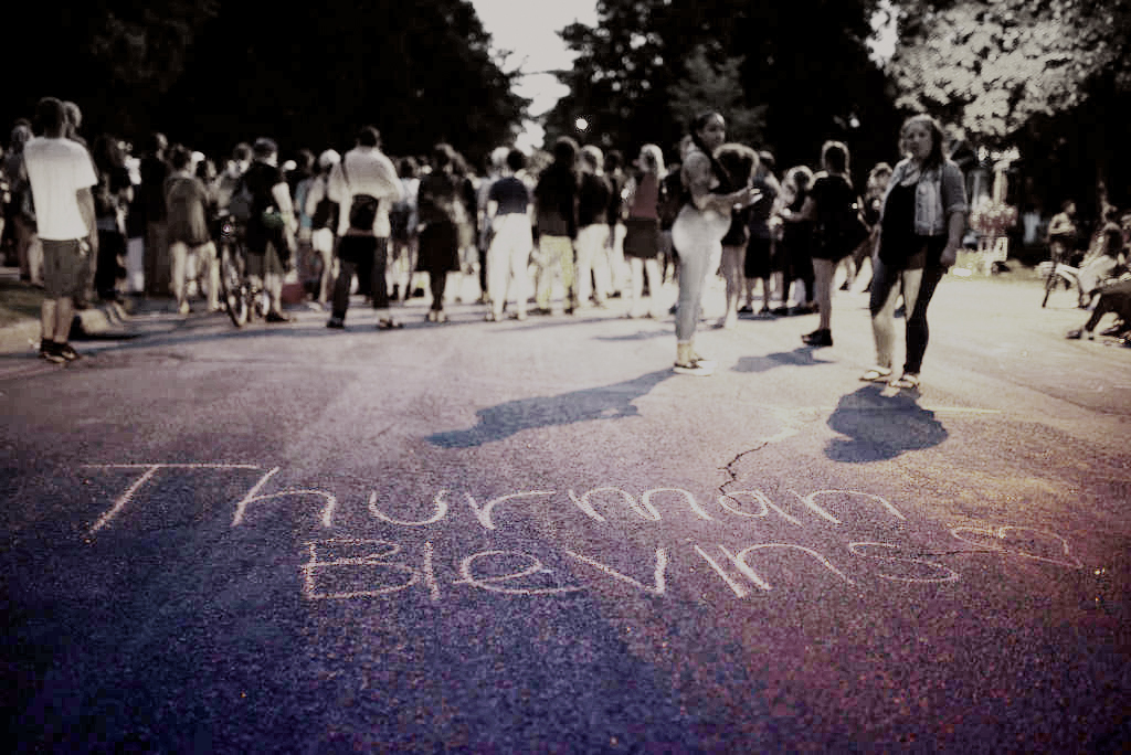 Minneapolis residents stand vigil for Thurman "June" Blevins on June 24, one day after he was killed by police and more than a month before law enforcement officials accidentally released private information revealing untold pieces of the story, potentially endangering dozens of witnesses. (CREDIT: Stephen Maturen/Getty Images/Diana Ofosu)