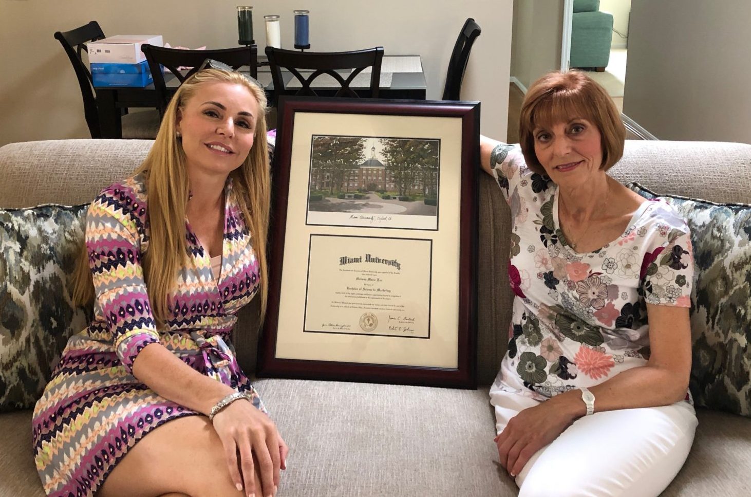 Republican candidate Melissa Howard (left) sitting with what is apparently a faked diploma.