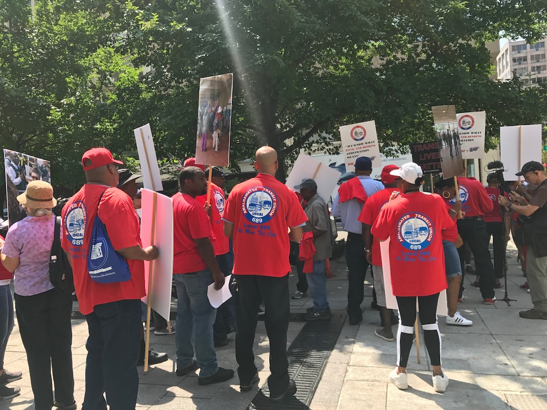 Unionized Metro workers demand the resignation of WMATA's general manager, Thursday, August 16, 2018. (PHOTO CREDIT: Casey Quinlan/ThinkProgress)