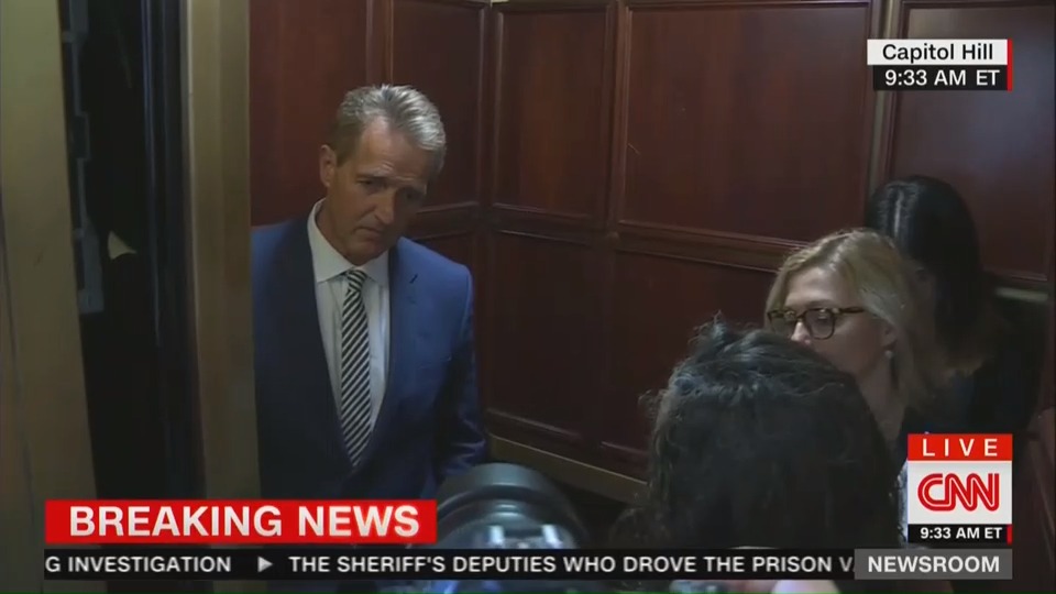 Sen. Jeff Flake (R-AZ) laughs off pleas from two rape survivors.