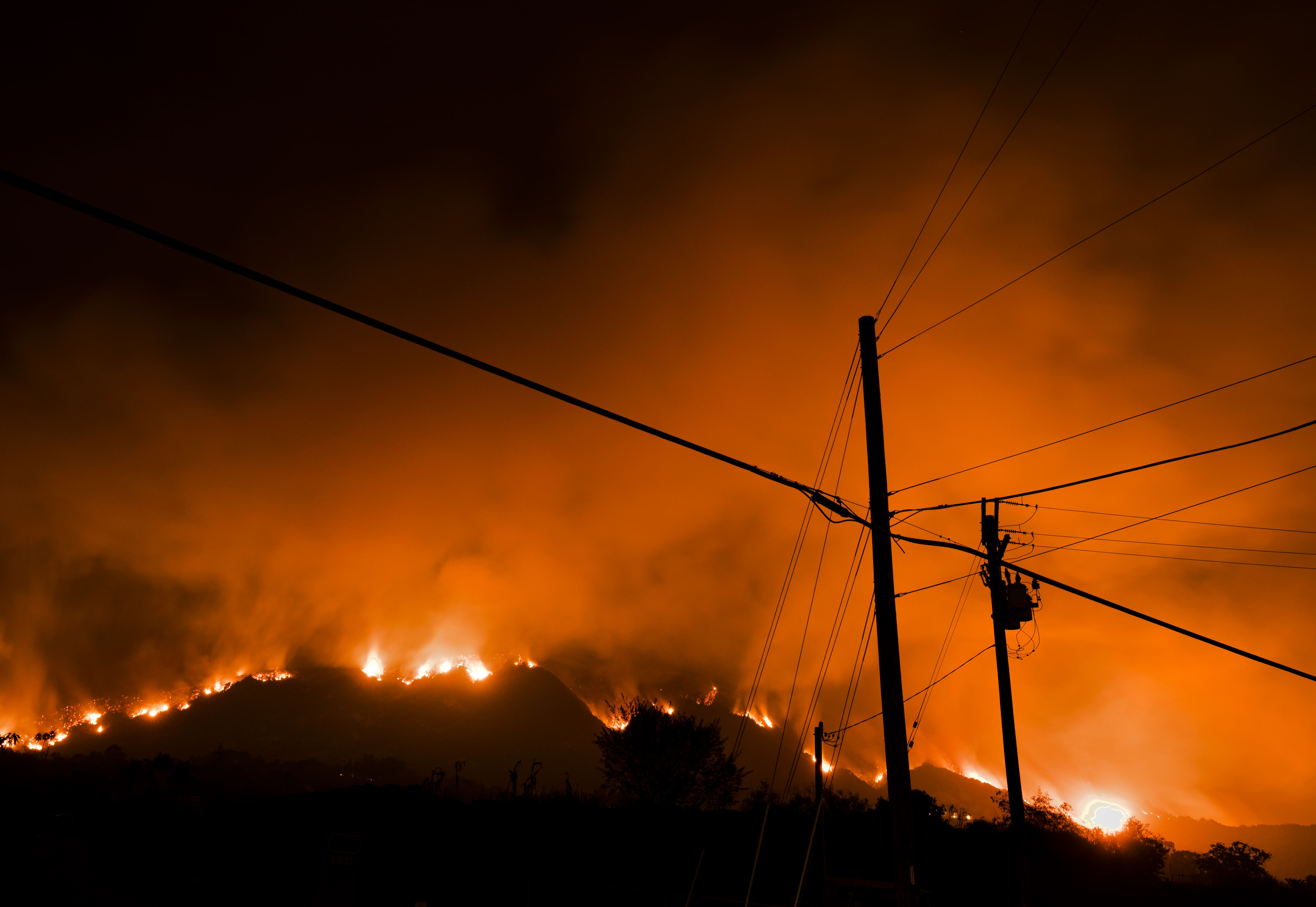 The Thomas wildfire burns in Carpinteria, California on December 11, 2017. CREDIT: Ronen Tivony/NurPhoto via Getty Images