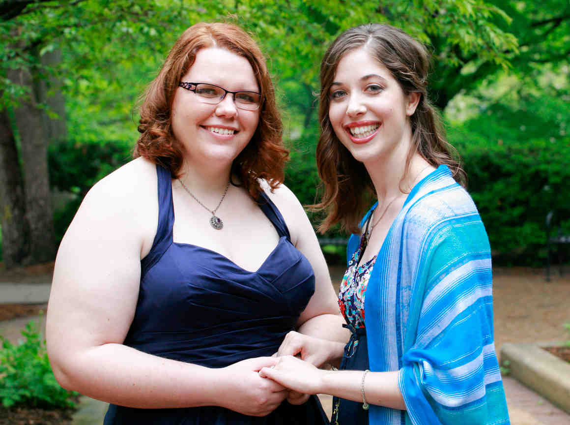 Erin and Rebecca Busk-Sutton, a same-sex couple turned away from a religious adoption agency in Michigan, are suing the state for contracting with religious child-placement agencies it knows will refuse service to same-sex couples. (PHOTO CREDIT: ACLU)