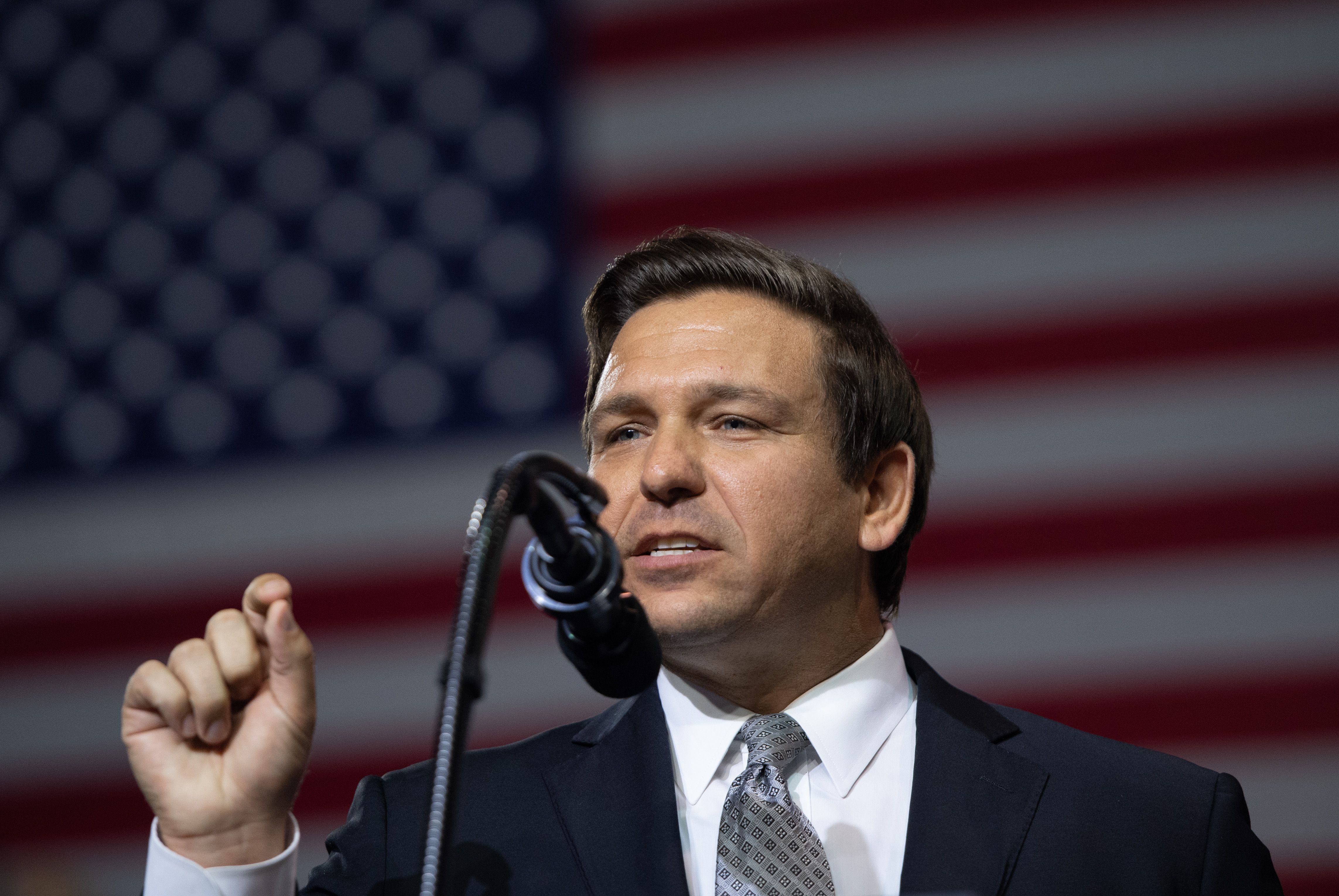 US Representative Ron DeSantis, Republican of Florida, and candidate for Florida Governor, speaks during a rally with US President Donald Trump at Florida State Fairgrounds Expo Hall in Tampa, Florida, on July 31, 2018. (Photo by SAUL LOEB / AFP) (Photo credit should read SAUL LOEB/AFP/Getty Images)