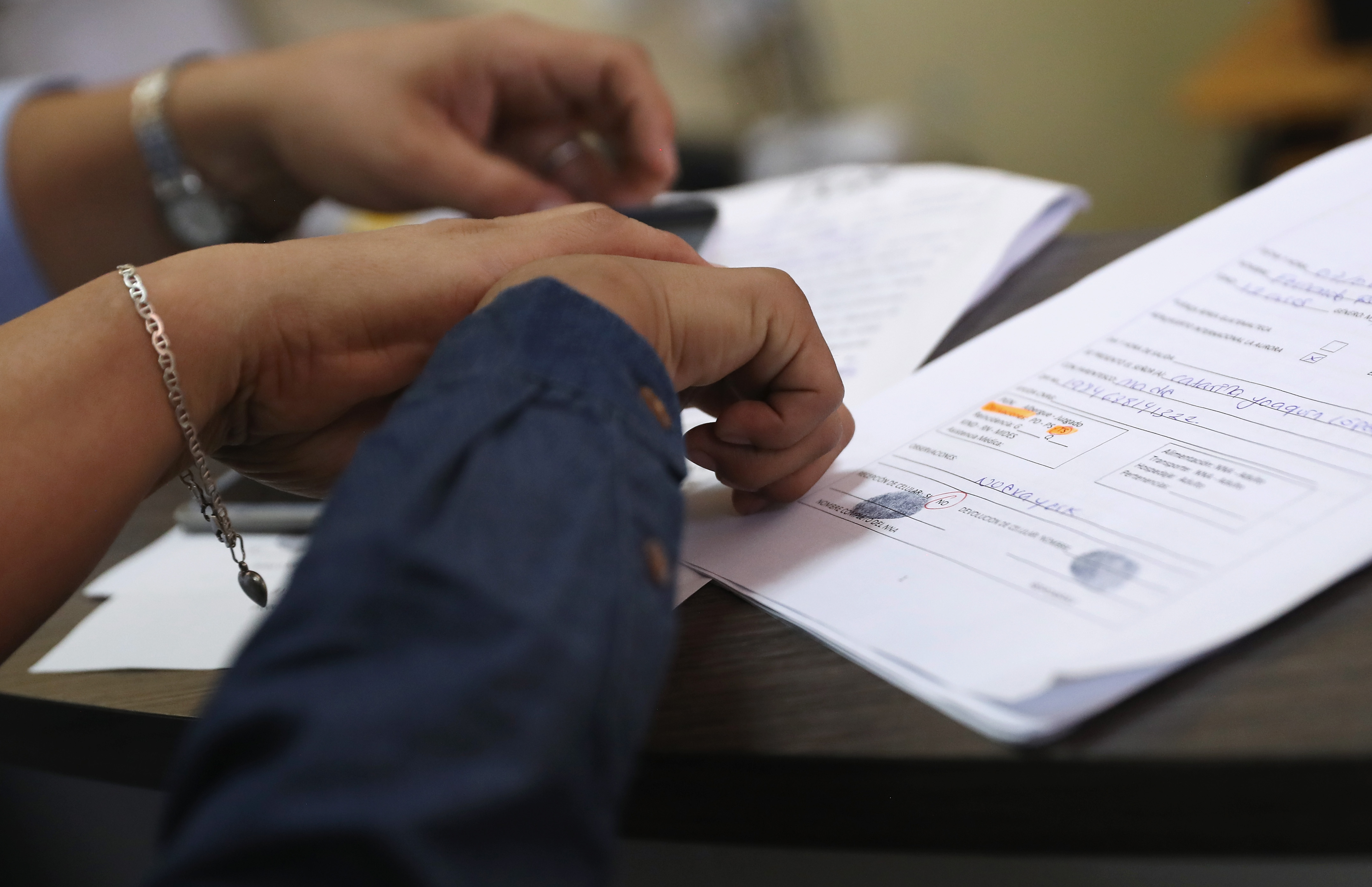 At least 99 immigrant children separated from their families and sent to detention facilities in Chicago are dealing with the long-term consequences of the Trump administration's "zero-tolerance" policy, according to a recent investigative report by ProPublica. (Photo credit: John Moore/Getty Images)