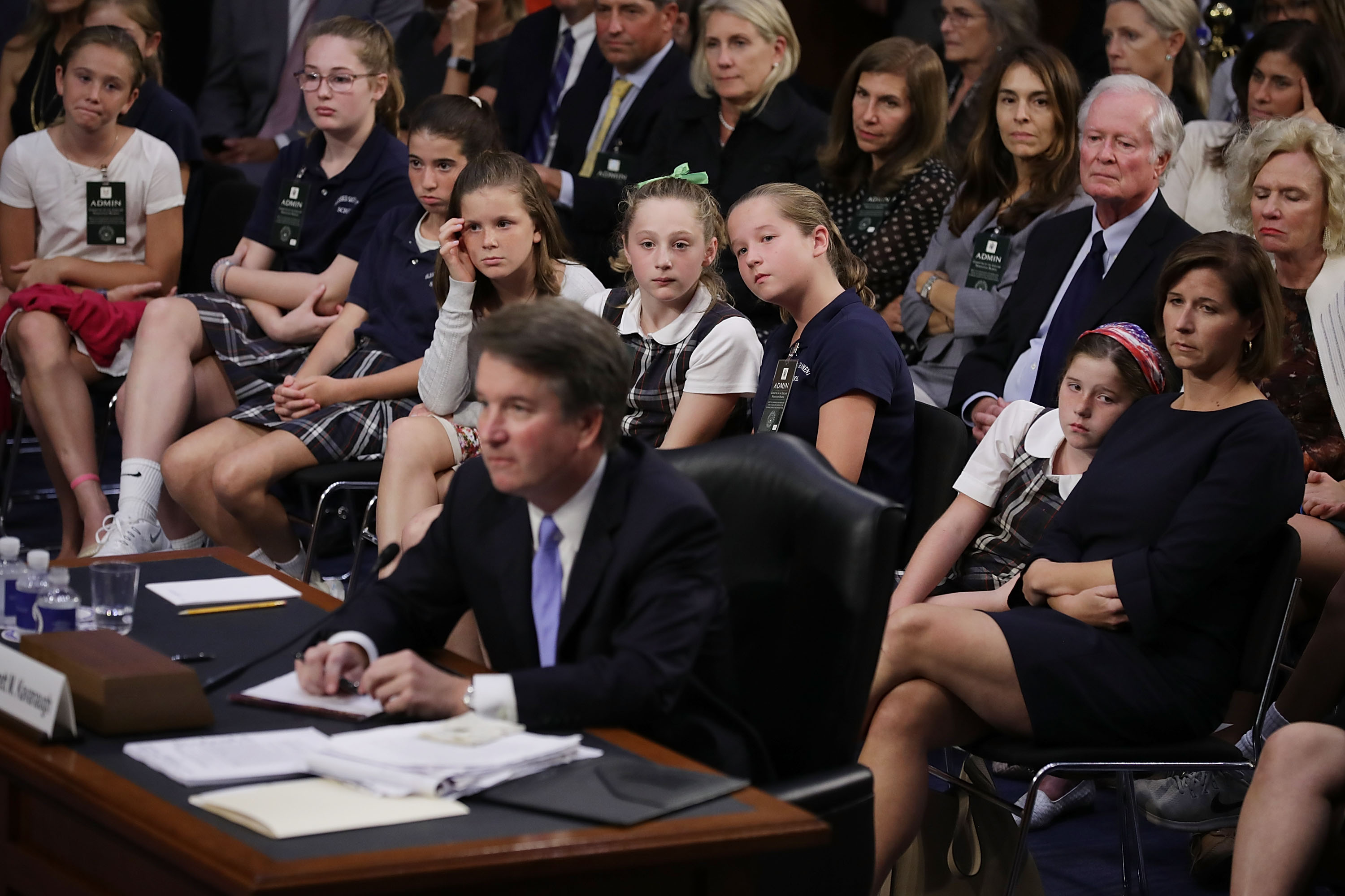 Children who played on teams coached by Supreme Court nominee Judge Brett Kavanaugh, along with his wife Ashley Kavanaugh and daughters (2nd R to L) Lisa and Margaret Kavanaugh, attend the third day of his confirmation hearing before the Senate Judiciary Committee on Capitol Hill September 6, 2018 in Washington, DC. (Credit: Chip Somodevilla/Getty Images)