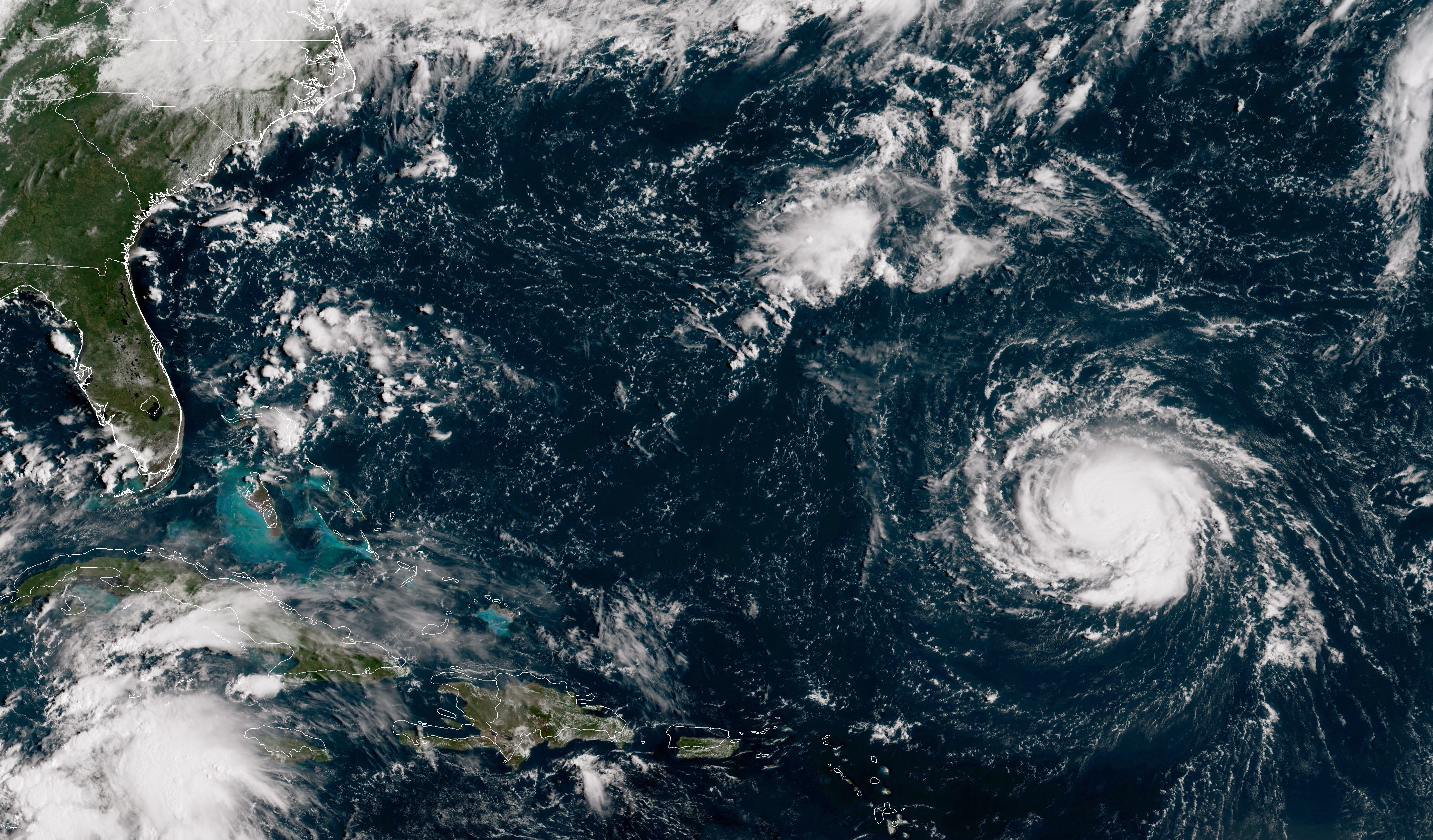 In this NOAA satellite handout image, shows Hurricane Florence as it travels west and gains strength in the Atlantic Ocean southeast of Bermuda on September 10, 2018. CREDIT: NOAA via Getty Images