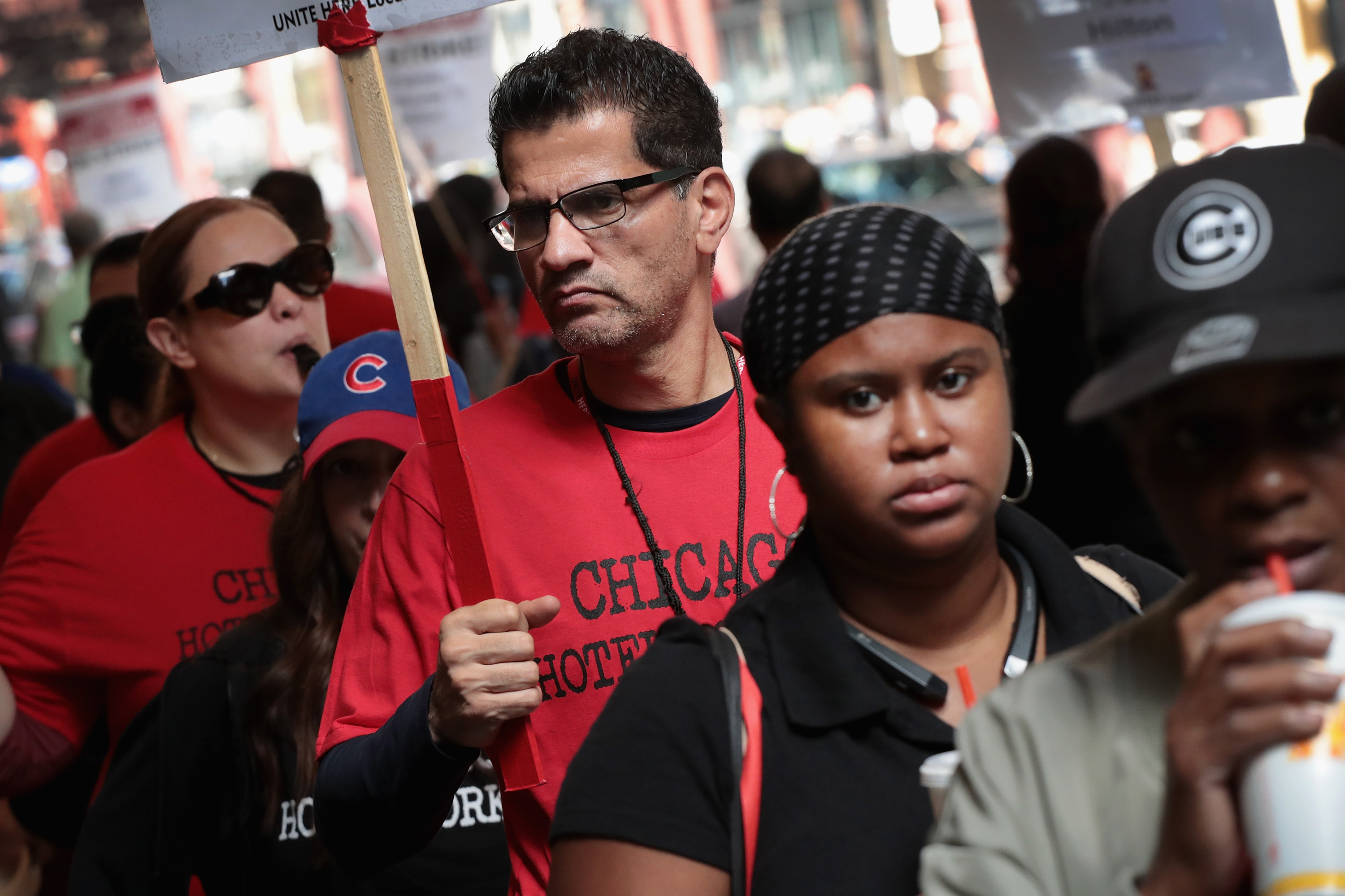 CHICAGO, IL - SEPTEMBER 10: Striking workers from the Palmer House Hilton walk a picket line in front of the hotel on September 10, 2018 in Chicago, Illinois. Thousands of housekeepers, servers, cooks and doormen walked off their jobs at 25 downtown hotels on Friday after failing to reach an agreement on a new labor contract. (Photo by Scott Olson/Getty Images)