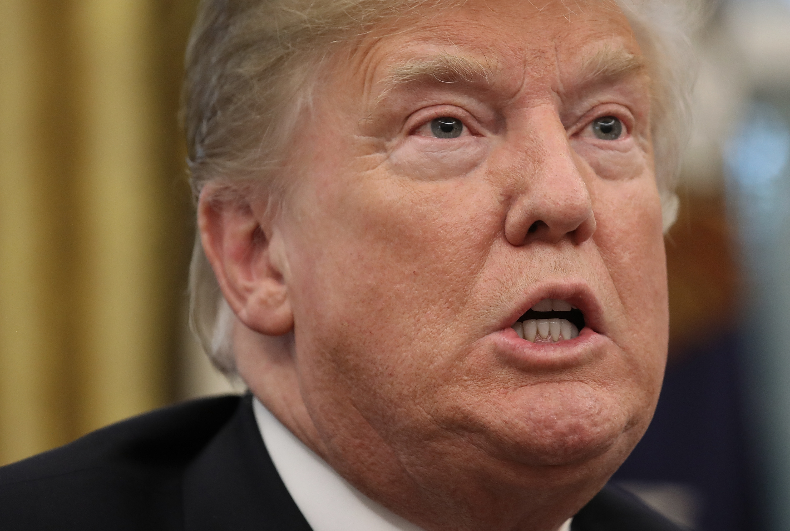 A NEW POLL REVEALS THAT SUBURBAN VOTERS MAY BE TURNING THEIR BACK ON PRESIDENT TRUMP THIS FALL. CREDIT: WIN MCNAMEE/GETTY IMAGES