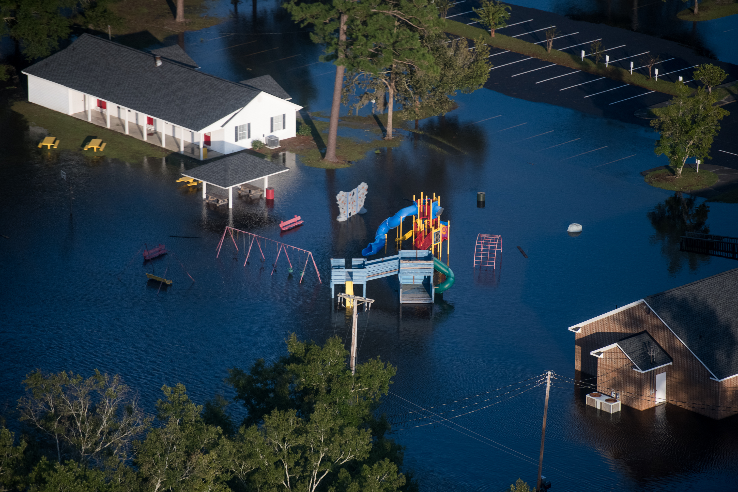 Floodwaters from Hurricane Florence surround a playground on September 17, 2018 in Conway, South Carolina. (Credit: Sean Rayford/Getty Images)