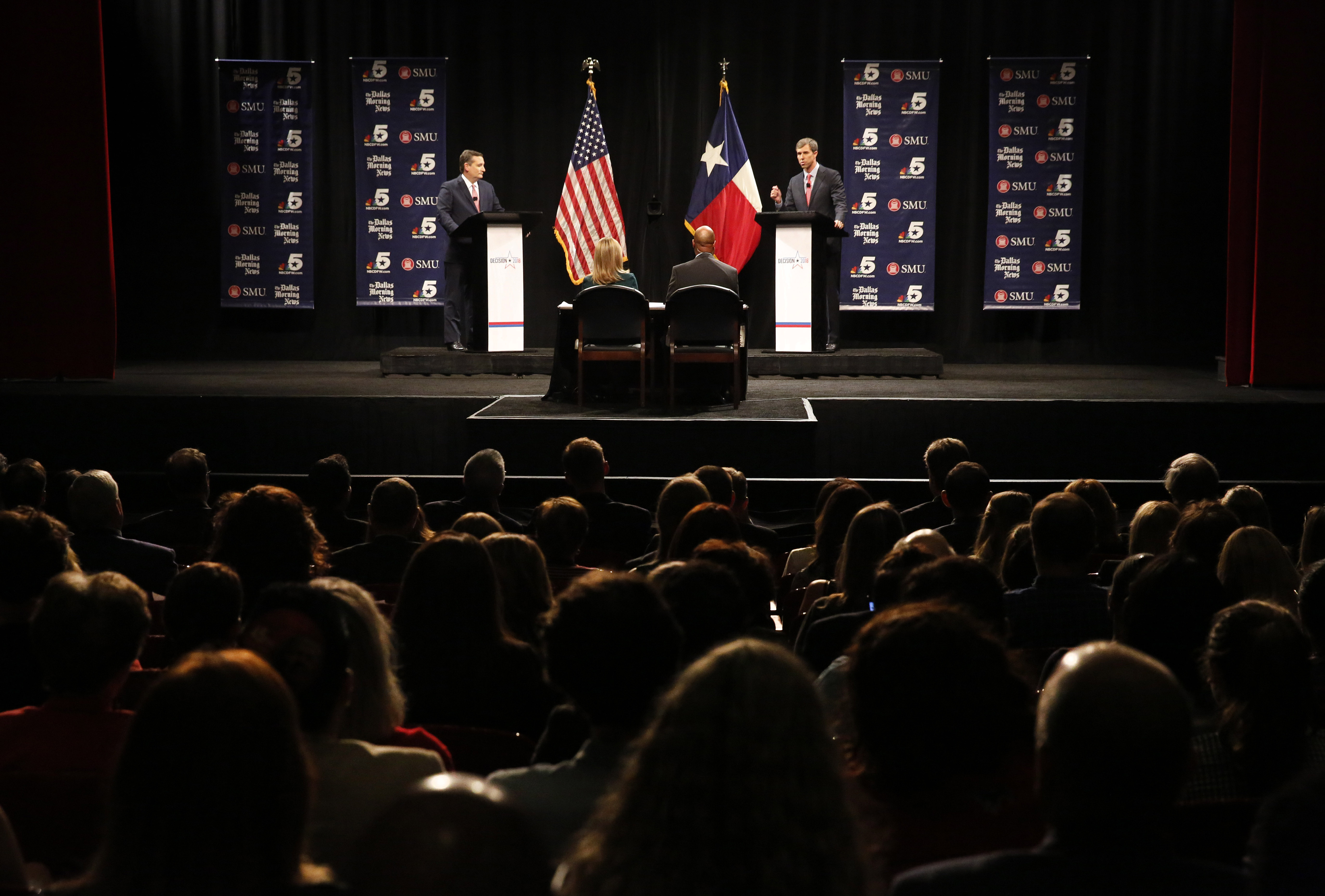 DALLAS, TX - SEPTEMBER 21: Rep. Beto O'Rourke (D-TX) makes a point as Sen. Ted Cruz (R-TX) waits his turn during a debate at McFarlin Auditorium at SMU on September 21, 2018 in Dallas, Texas. (Photo by Tom Fox-Pool/Getty Images)