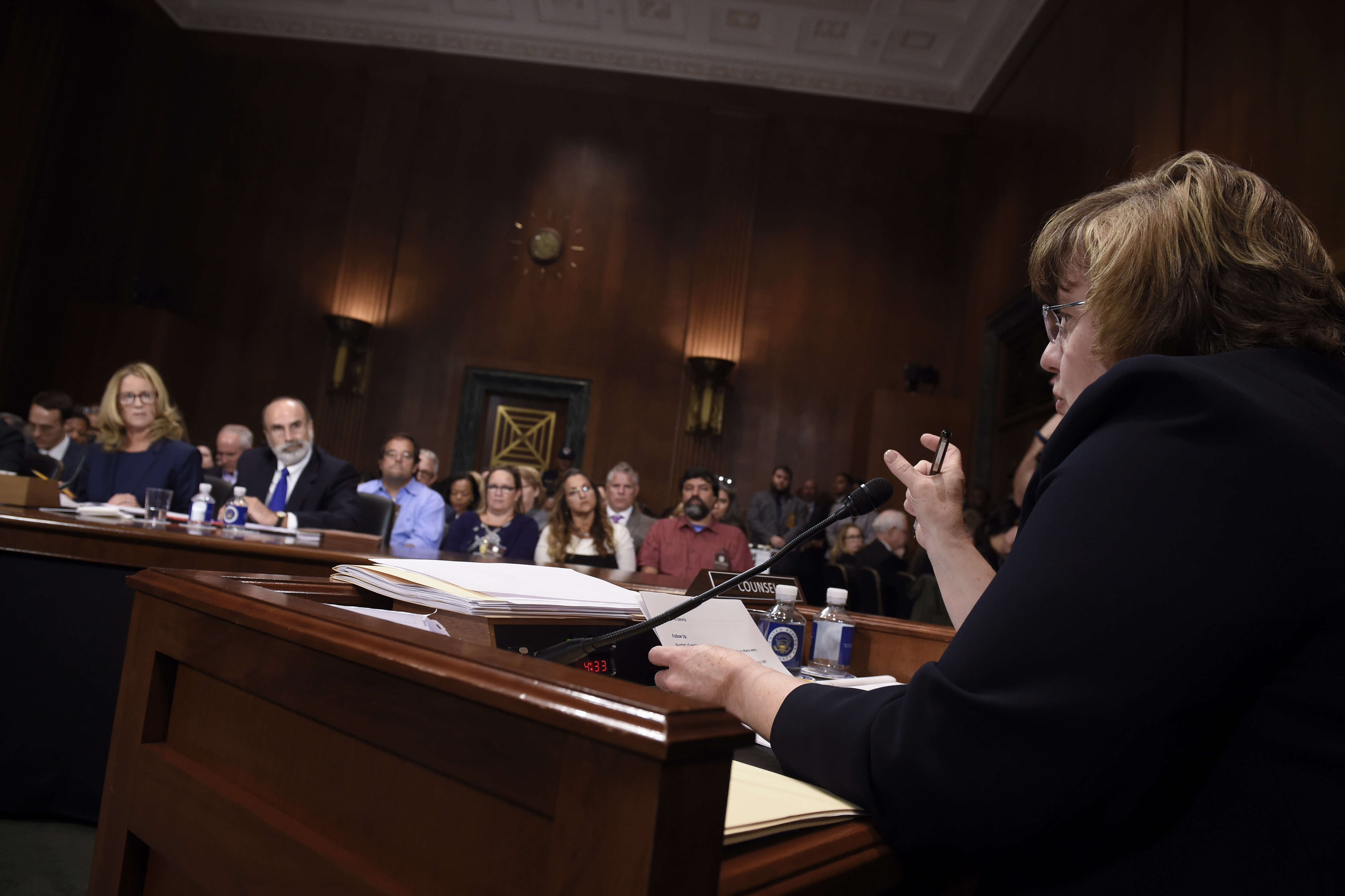 Rachel Mitchell (R), a prosecutor from Arizona, asks questions to Christine Blasey Ford (L), the woman accusing Supreme Court nominee Brett Kavanaugh of sexually assaulting her at a party 36 years ago, before the US Senate Judiciary Committee on Capitol Hill in Washington, DC, September 27, 2018. (Photo by SAUL LOEB / POOL / AFP) (Photo credit should read SAUL LOEB/AFP/Getty Images)