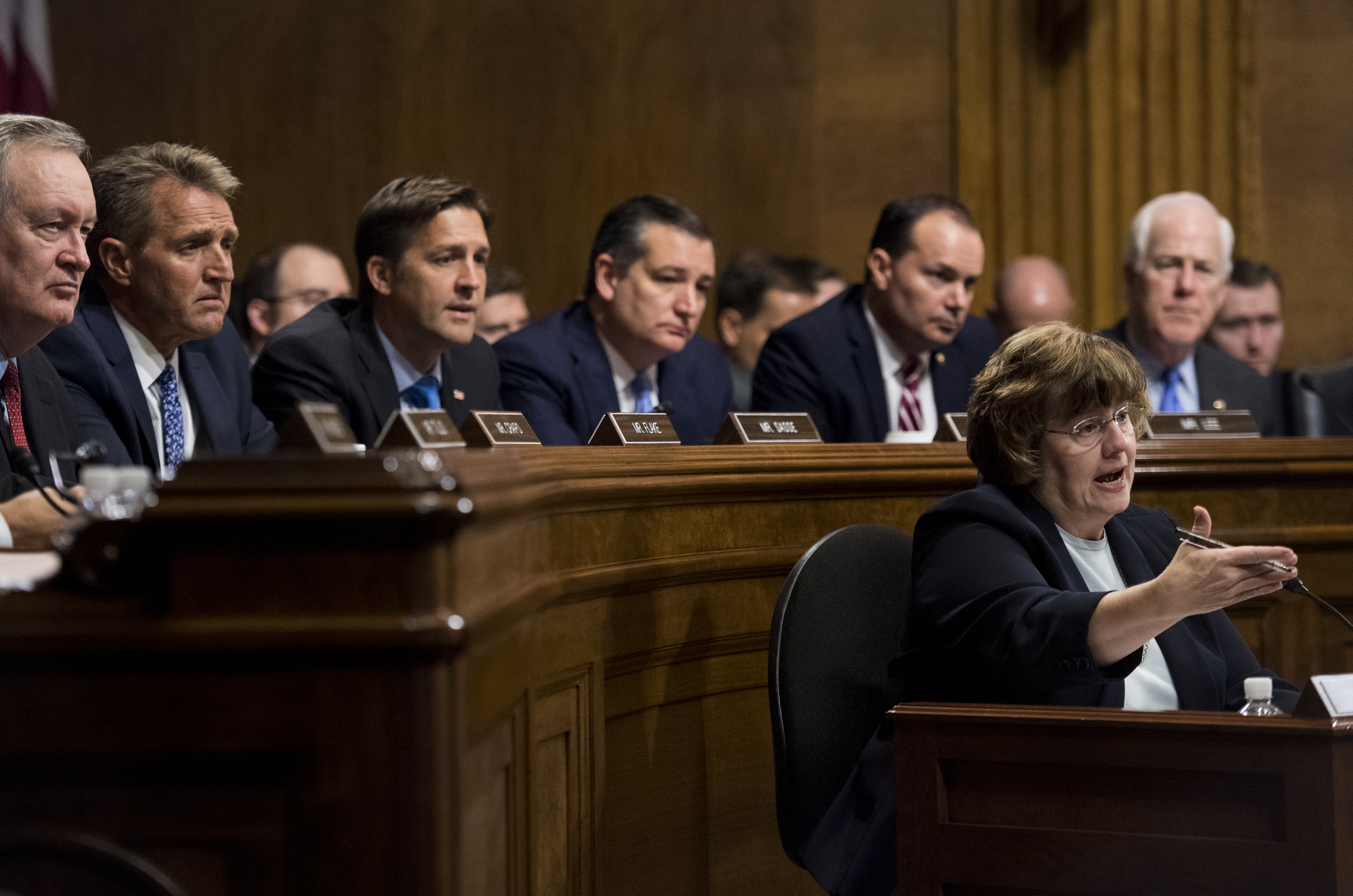 Rachel Mitchell, counsel for Senate Judiciary Committee Republicans, questions Dr. Christine Blasey Ford as the men who hired her watch silently. CREDIT: Tom Williams-Pool/Getty Images