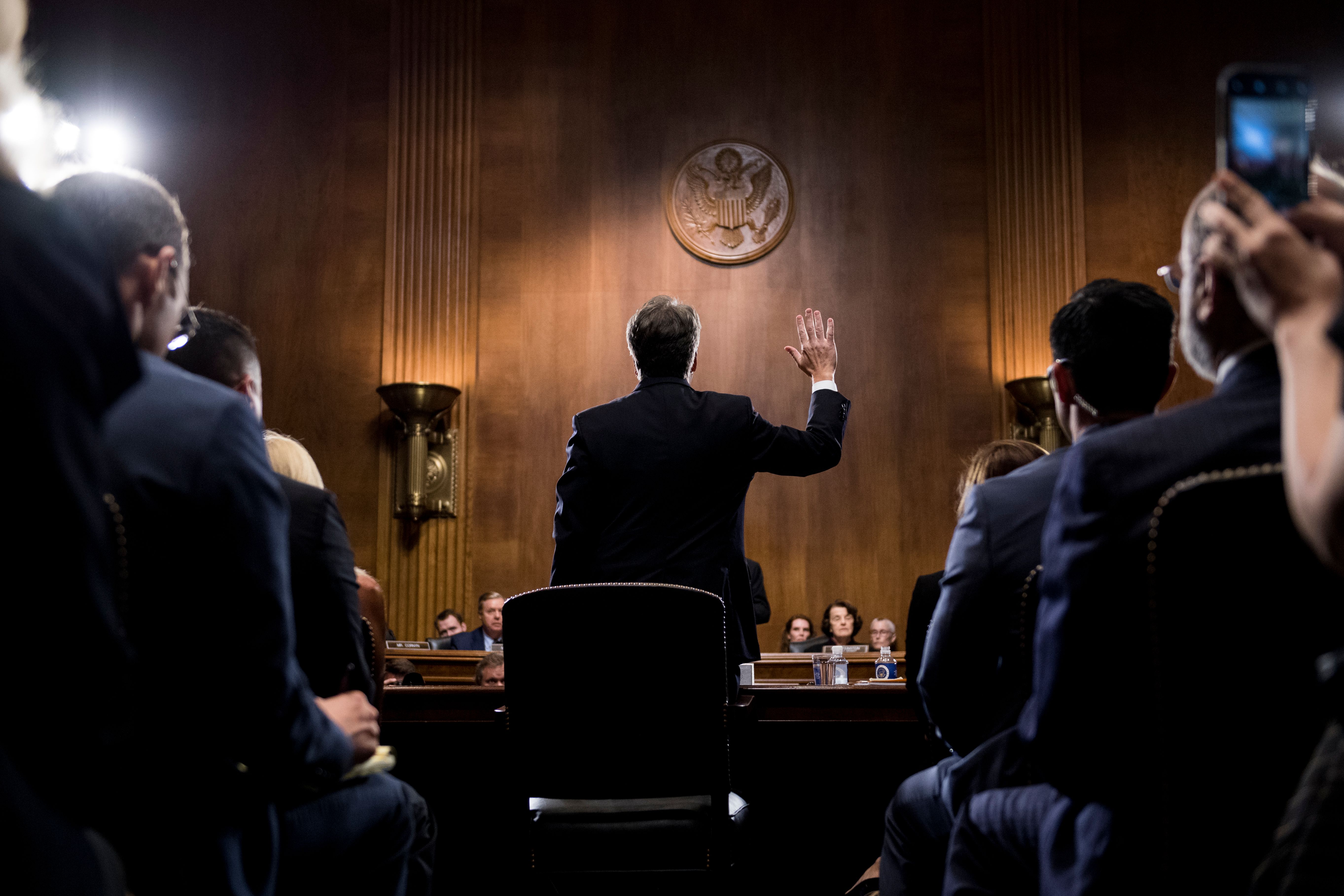 Supreme Court nominee Judge Brett Kavanaugh is sworn in before testifying at the Senate Judiciary Committee on Thursday. CREDOT: TOM WILLIAMS/AFP/Getty Images