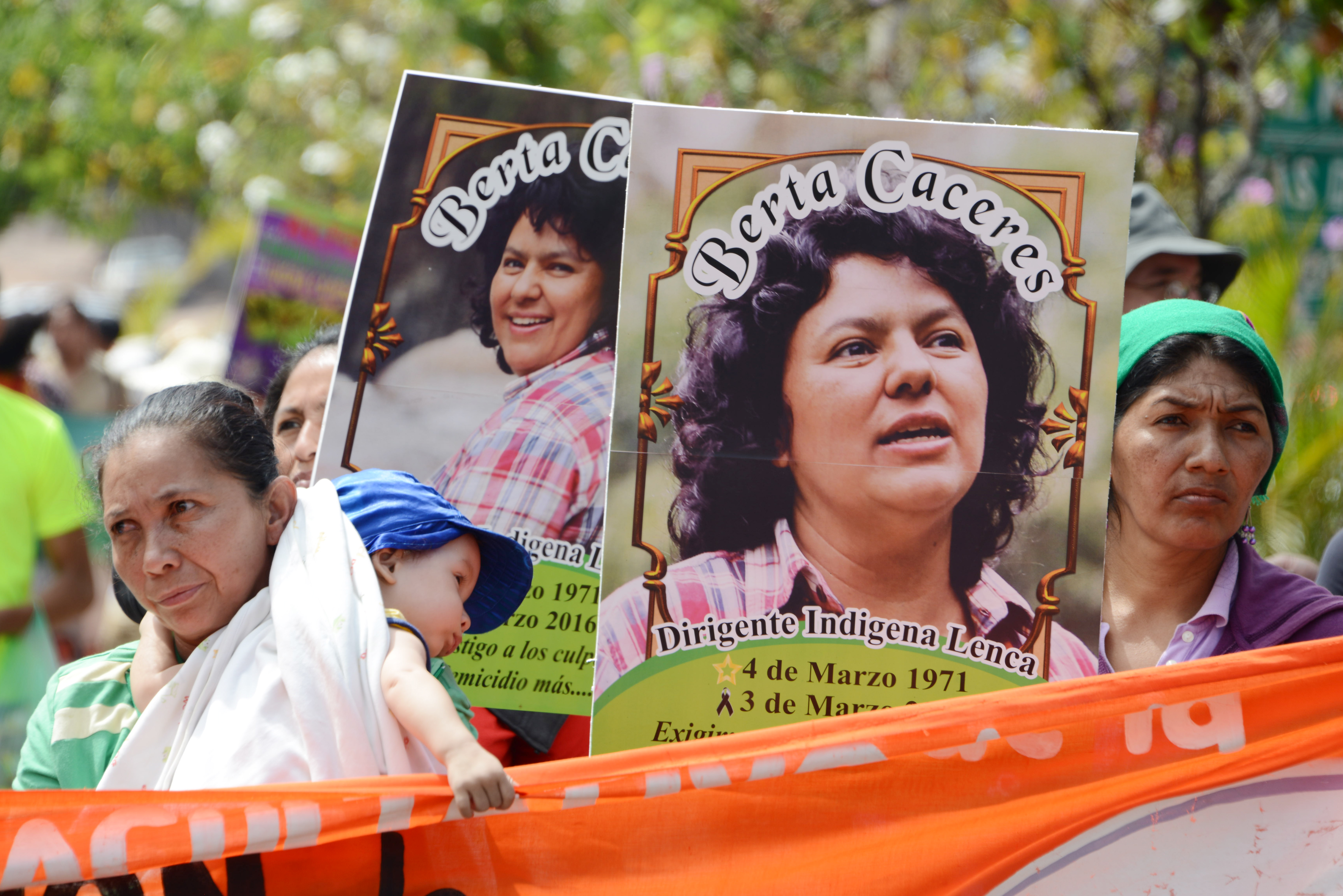 Slain Honduran environmentalist Berta Caceres posters are carried during a International Women's day demonstration in Tegucigalpa on March 08, 2016. AFP PHOTO /Orlando SIERRA. / AFP / ORLANDO SIERRA (Photo credit should read ORLANDO SIERRA/AFP/Getty Images)