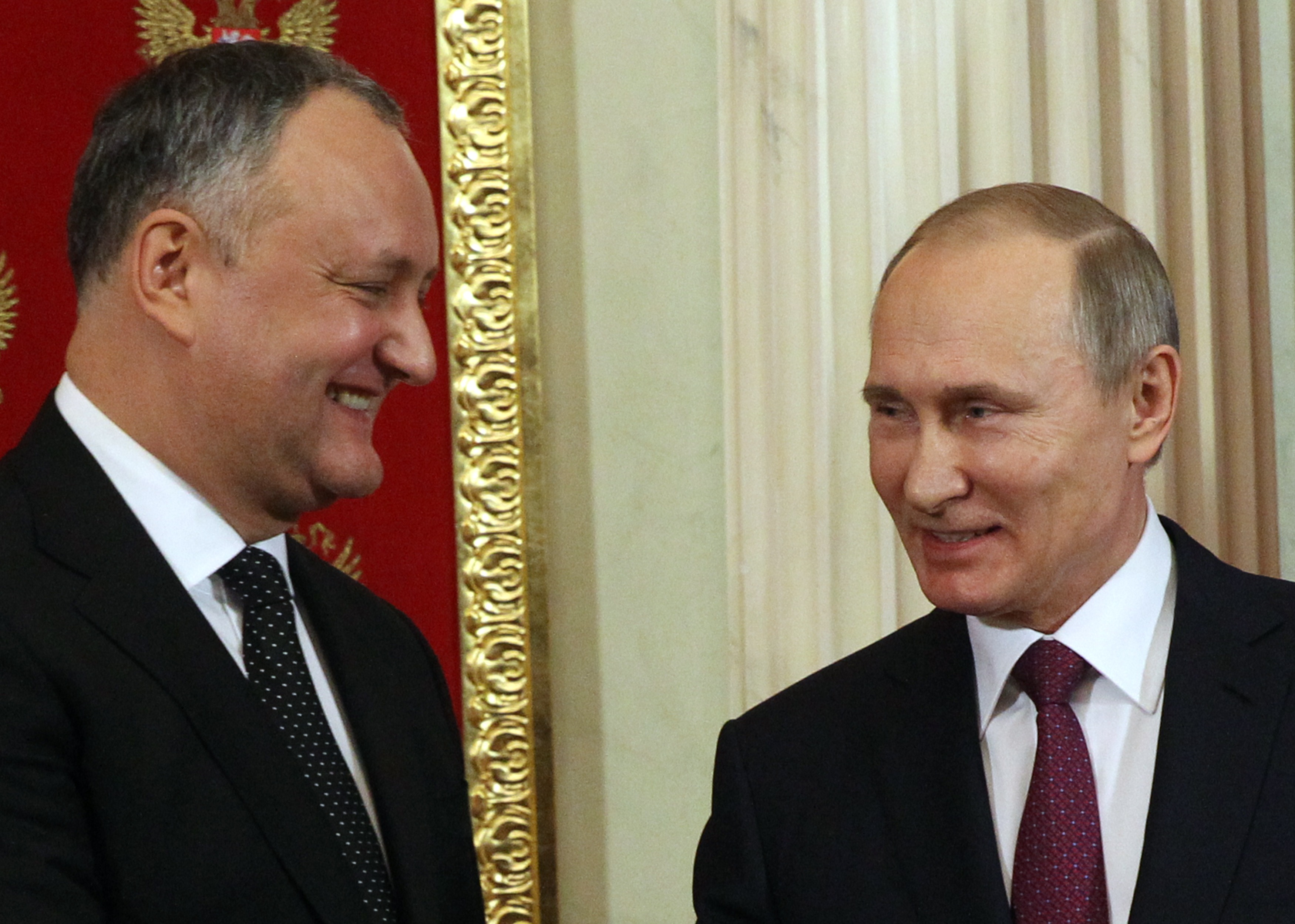 Moldova, headed by President Igor Dodon (left), will be hosting a series of Russian and American Christian fundamentalists this week. CREDIT: MIKHAIL SVETLOV / GETTY