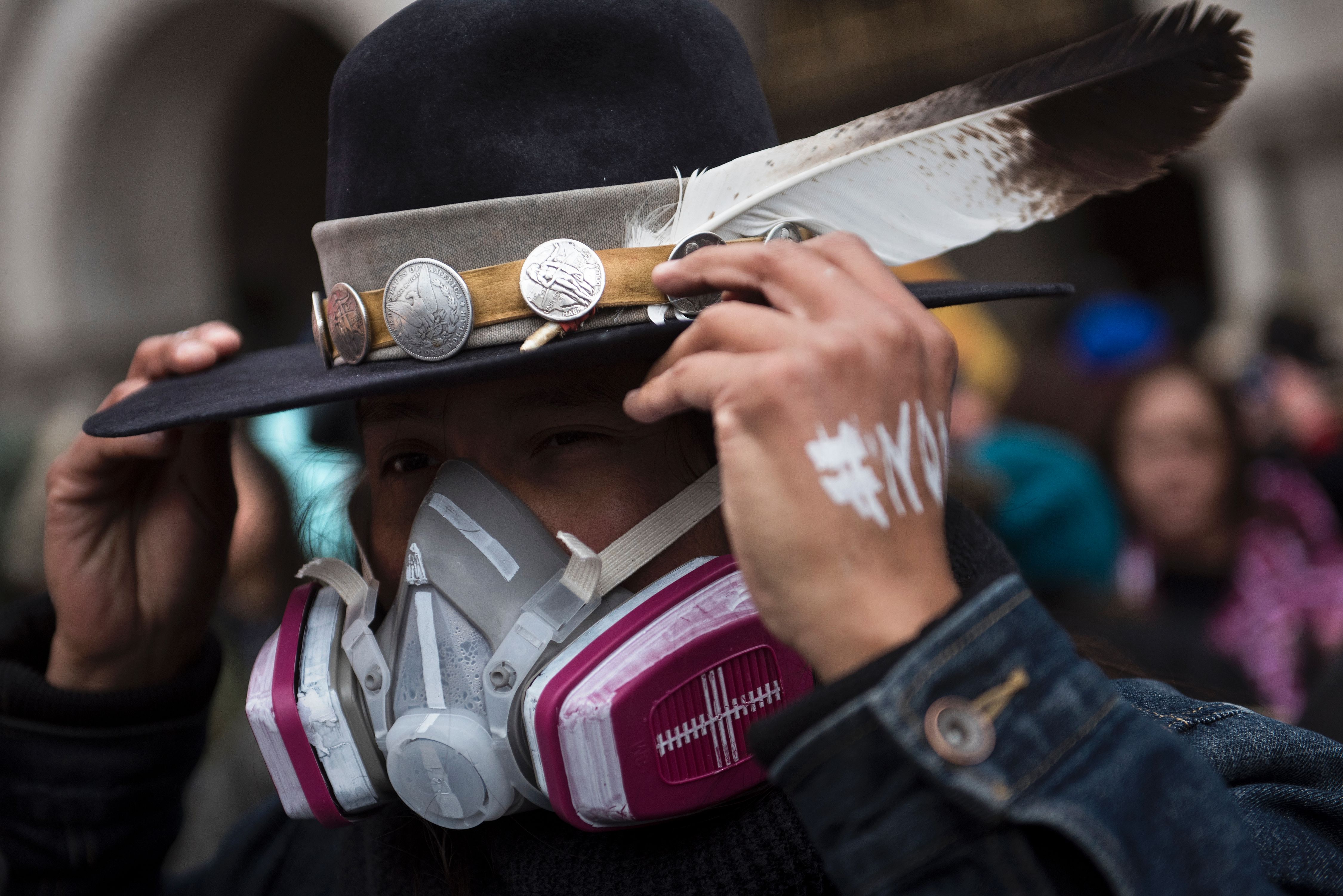 A 2017 activist opposing the Keystone XL pipeline may see new cause for protest. CREDIT: BRENDAN SMIALOWSKI / GETTY