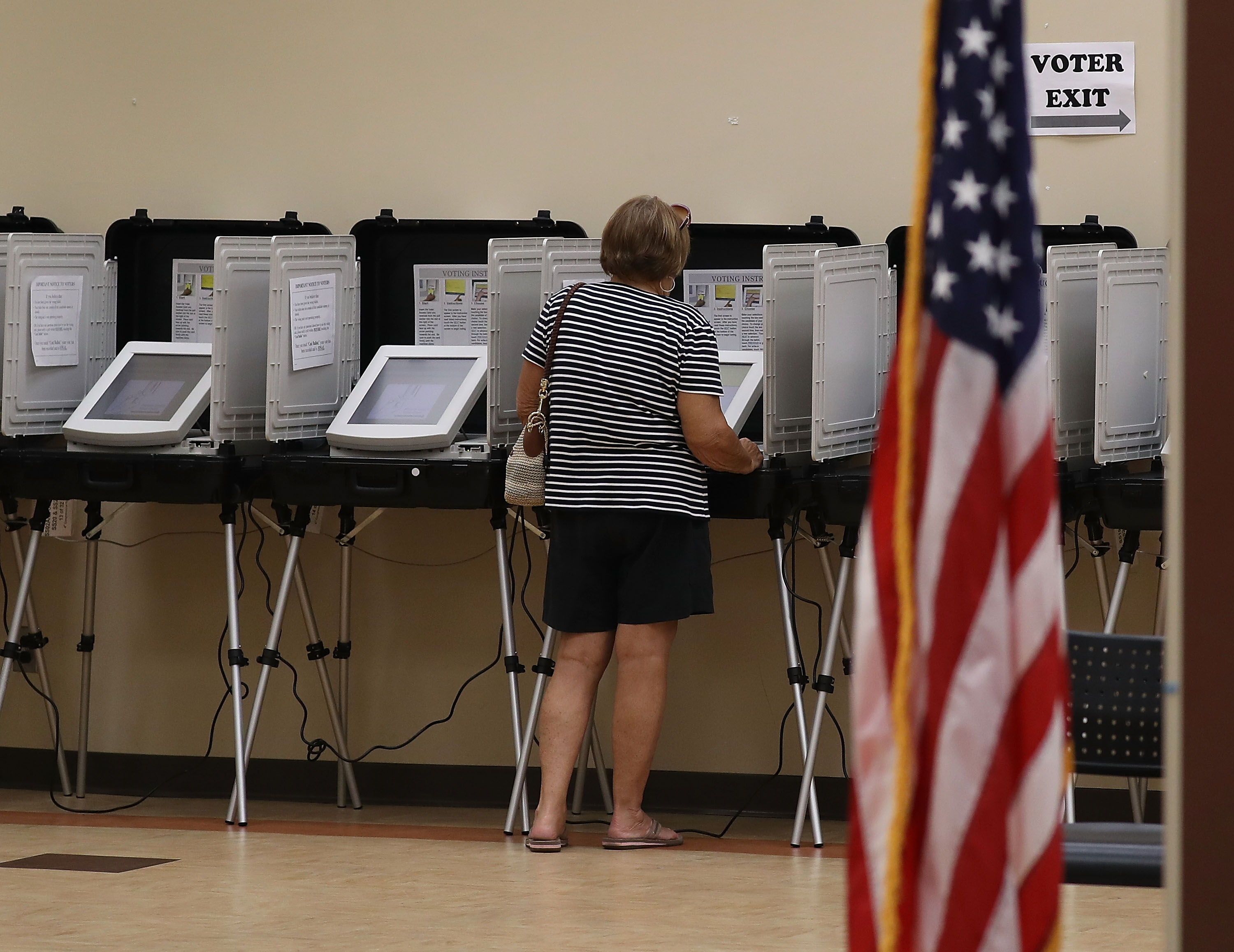 A woman casts her ballot during a special election in Georgia's 6th Congressional District special election at North Fulton Government Service Center on June 20, 2017 in Sandy Springs,, Georgia. Democrat Jon Ossoff and Republican Karen Handel are vying to replace Tom Price, who is now the Secretary of Health and Human Services. The election will fill a congressional seat that has been held by a Republican since the 1970s. (Photo by Joe Raedle/Getty Images)