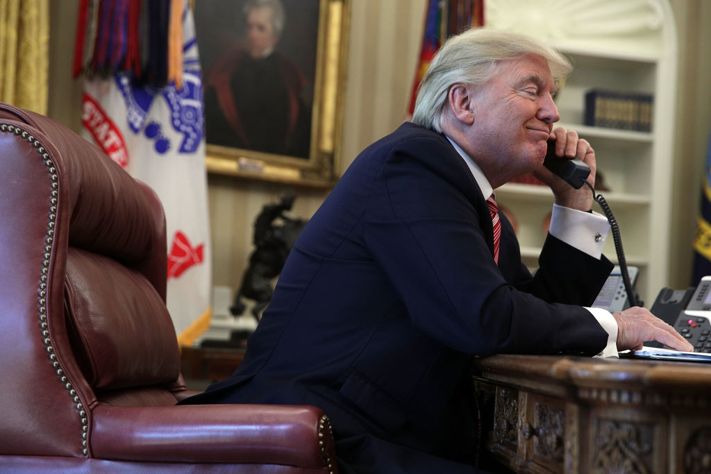 HELLO YES THIS IS THE PRESIDENT ARE THESE TEXTS GETTING THROUGH CREDIT: Alex Wong/Getty Images