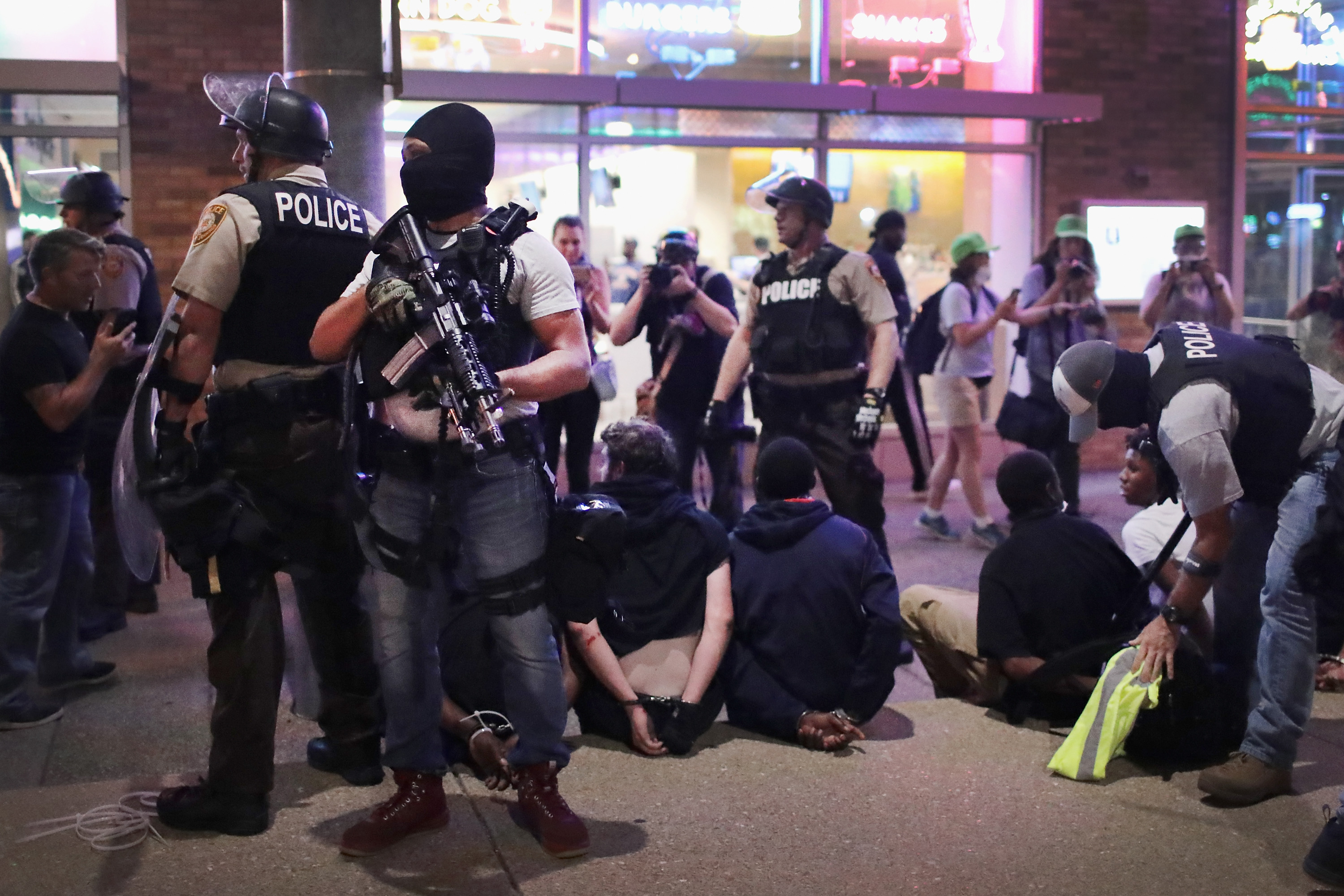 Police arrest demonstrators protesting the acquittal of former St. Louis police officer Jason Stockley on September 16, 2017. CREDIT: Scott Olson/Getty Images