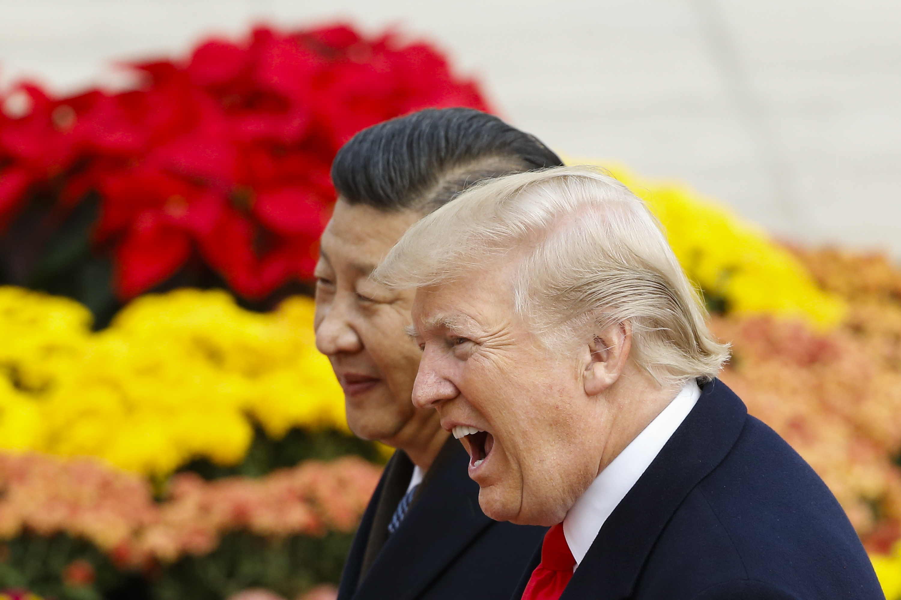 BEIJING, CHINA - NOVEMBER 9: U.S. President Donald Trump takes part in a welcoming ceremony with China's President Xi Jinping on November 9, 2017 in Beijing, China. (Photo by Thomas Peter-Pool/Getty Images)