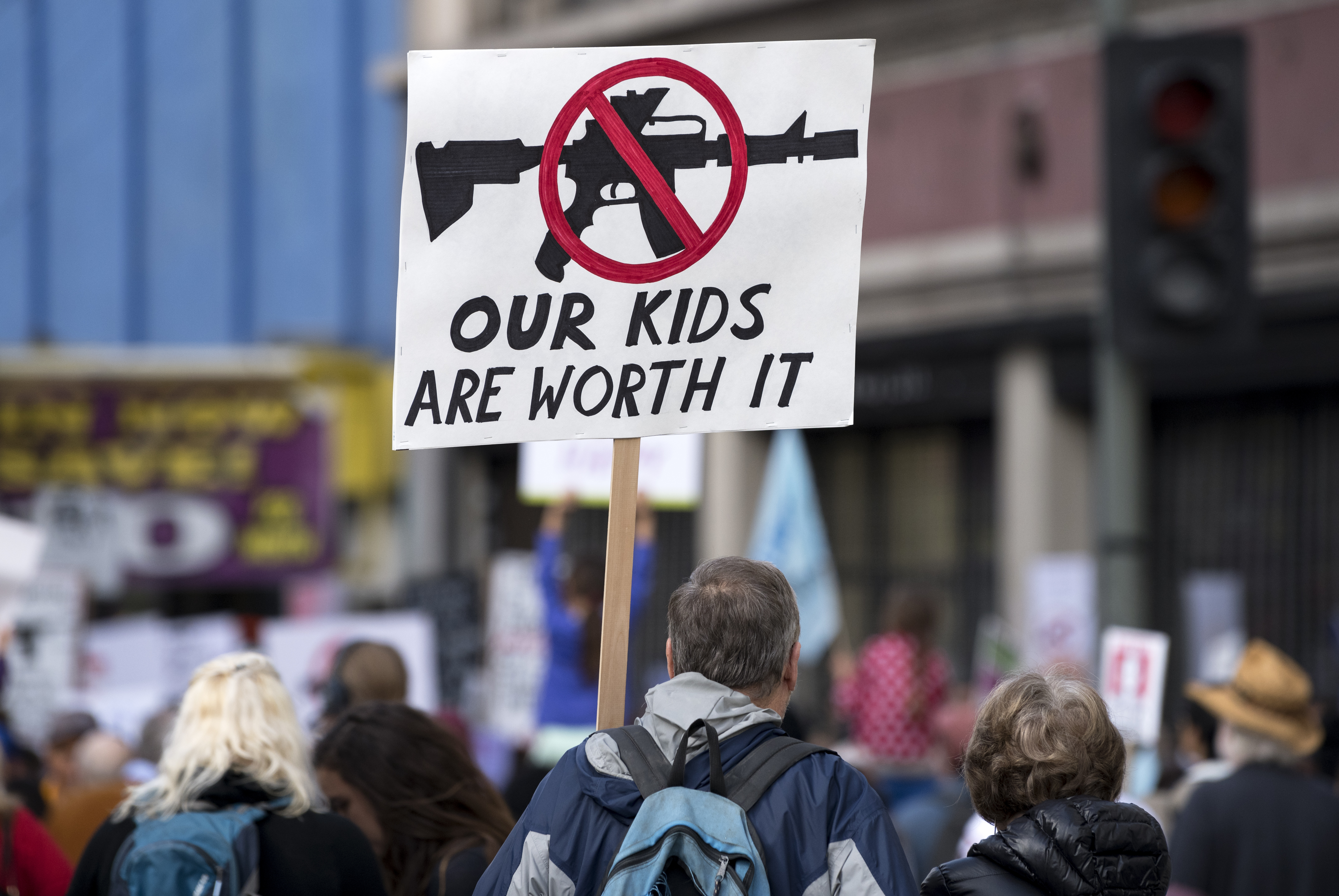 People take part in March for Our Lives in Los Angeles, California on March 24, 2018. The march was organized in response to the massacre at Marjory Stoneman Douglas High School in Florida where 17 people were killed in a mass shooting. Similar gun control rallies took place across the US. (Photo by Ronen Tivony/NurPhoto via Getty Images)