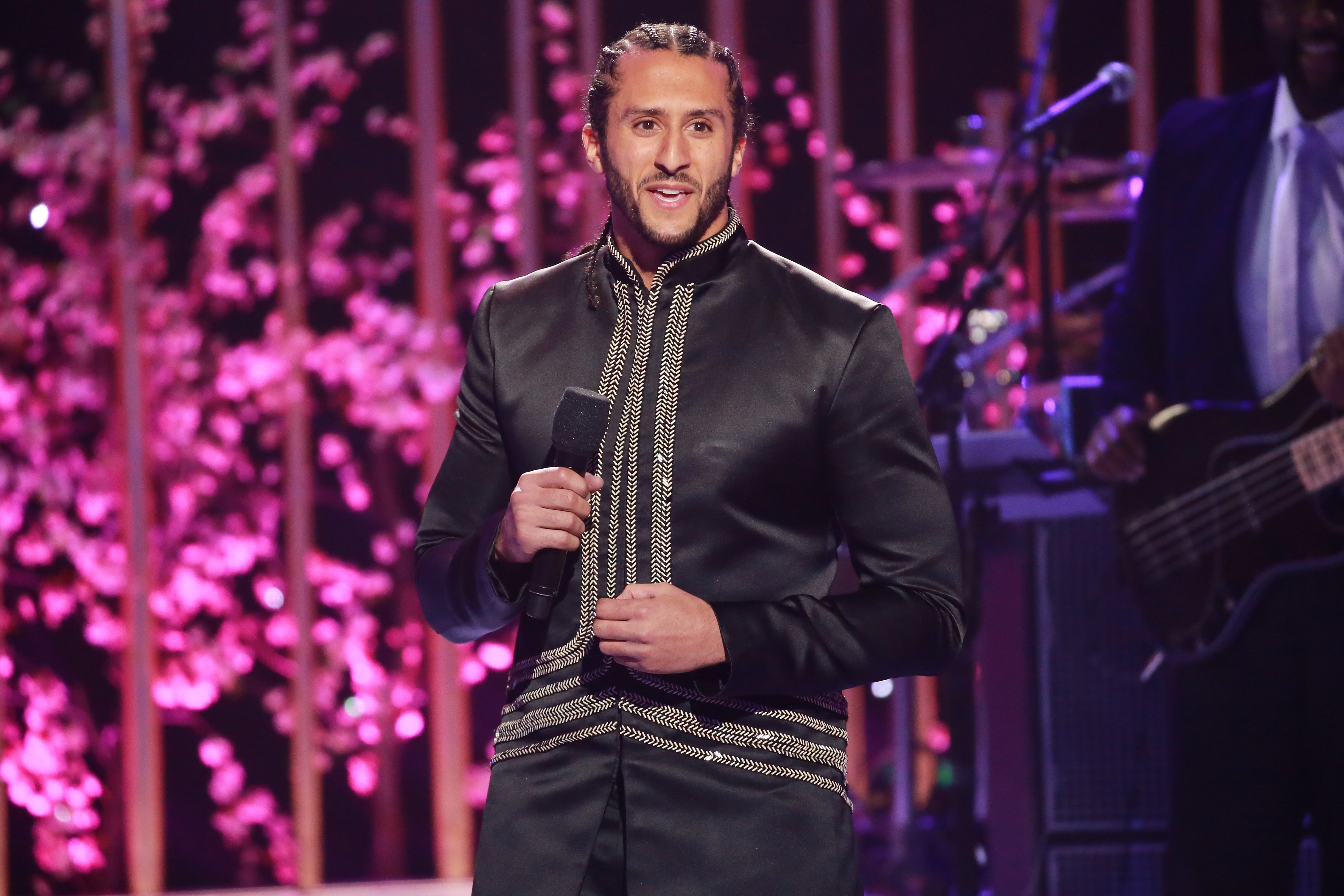 LOS ANGELES, CA - MAY 03: NFL player Colin Kaepernick speaks onstage during VH1's 3rd Annual "Dear Mama: A Love Letter To Moms" - Inside Show at The Theatre at Ace Hotel on May 3, 2018 in Los Angeles, California. (Photo by Leon Bennett/Getty Images)