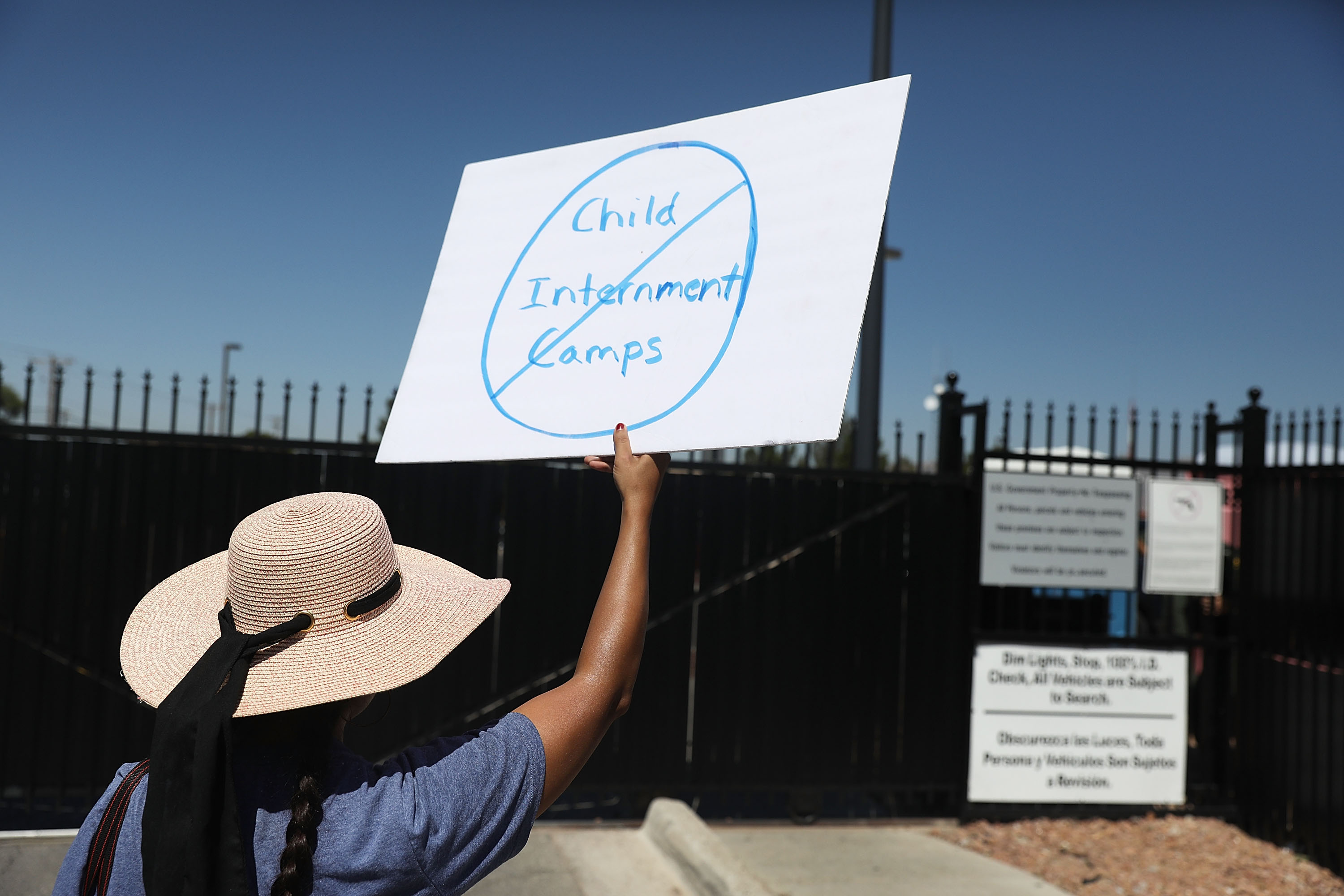 EL PASO, TX - JUNE 19: Noelle Andrade and others protest the separation of children from their parents in front of the El Paso Processing Center, an immigration detention facility, at the Mexican border on June 19, 2018 in El Paso, Texas. The separations have received intense scrutiny as the Trump administration institutes a zero tolerance policy on illegal immigration. (Photo by Joe Raedle/Getty Images)