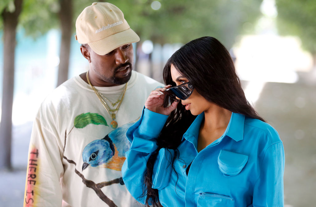 Kanye West and Kim Kardashian attend the Louis Vuitton Menswear Spring/Summer 2019 show as part of Paris Fashion Week Week on June 21, 2018 in Paris, France. CREDIT: Chesnot/WireImage