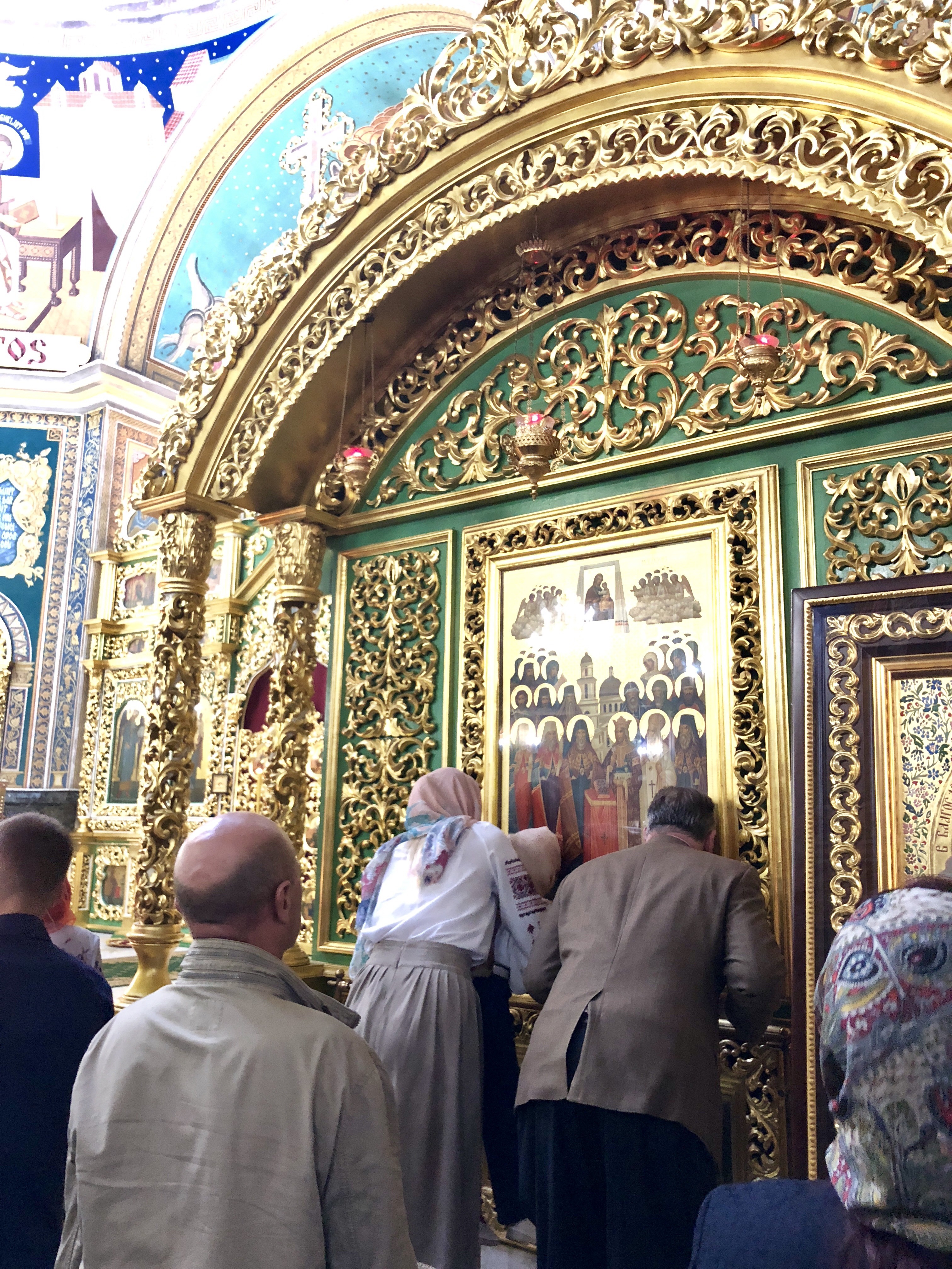 Brian Brown (right) participating in a Moldovan Orthodox ceremony last weekend. CREDIT: CASEY MICHEL
