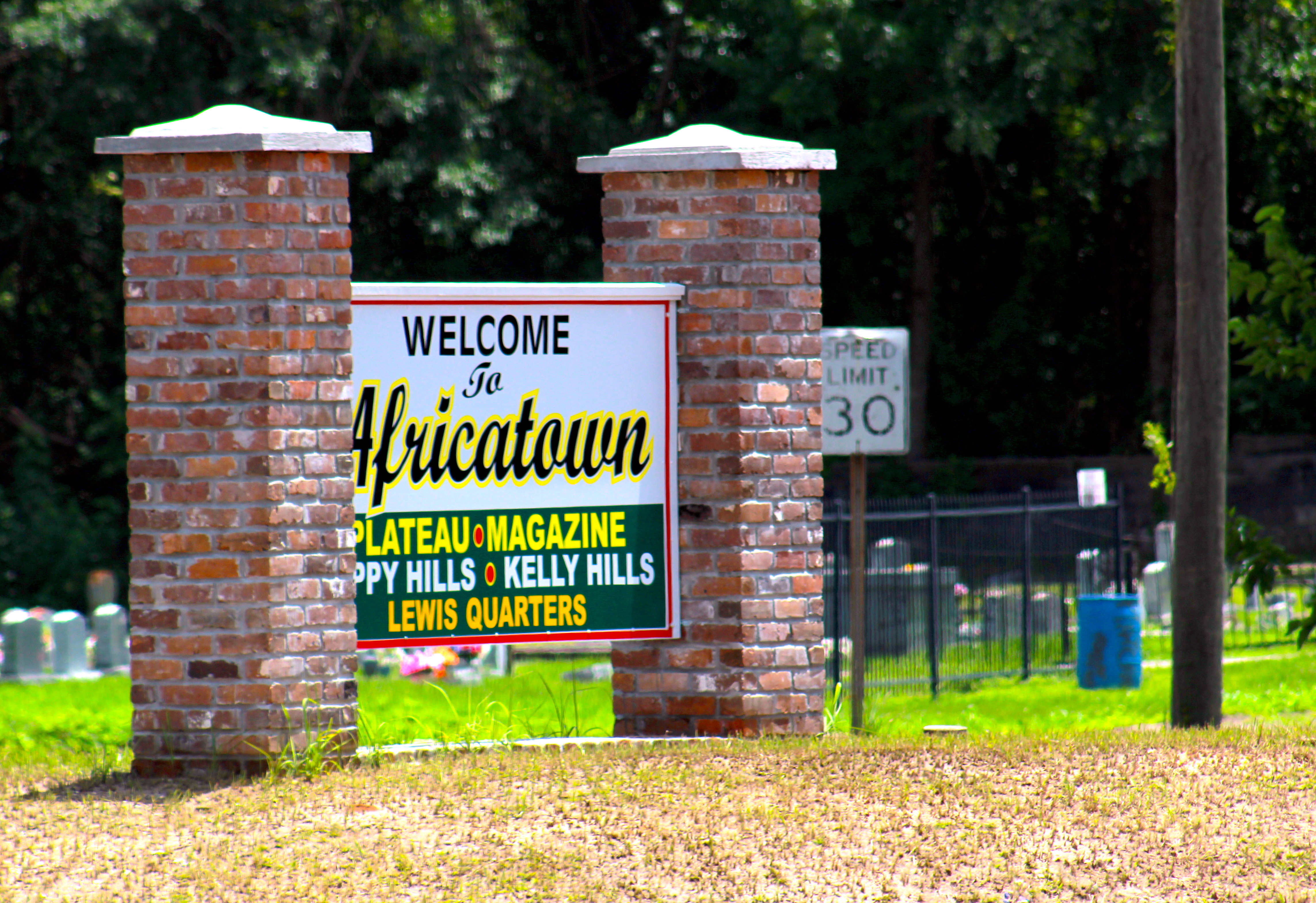 A sign welcoming visitors to Africatown. CREDIT: Amy Walker