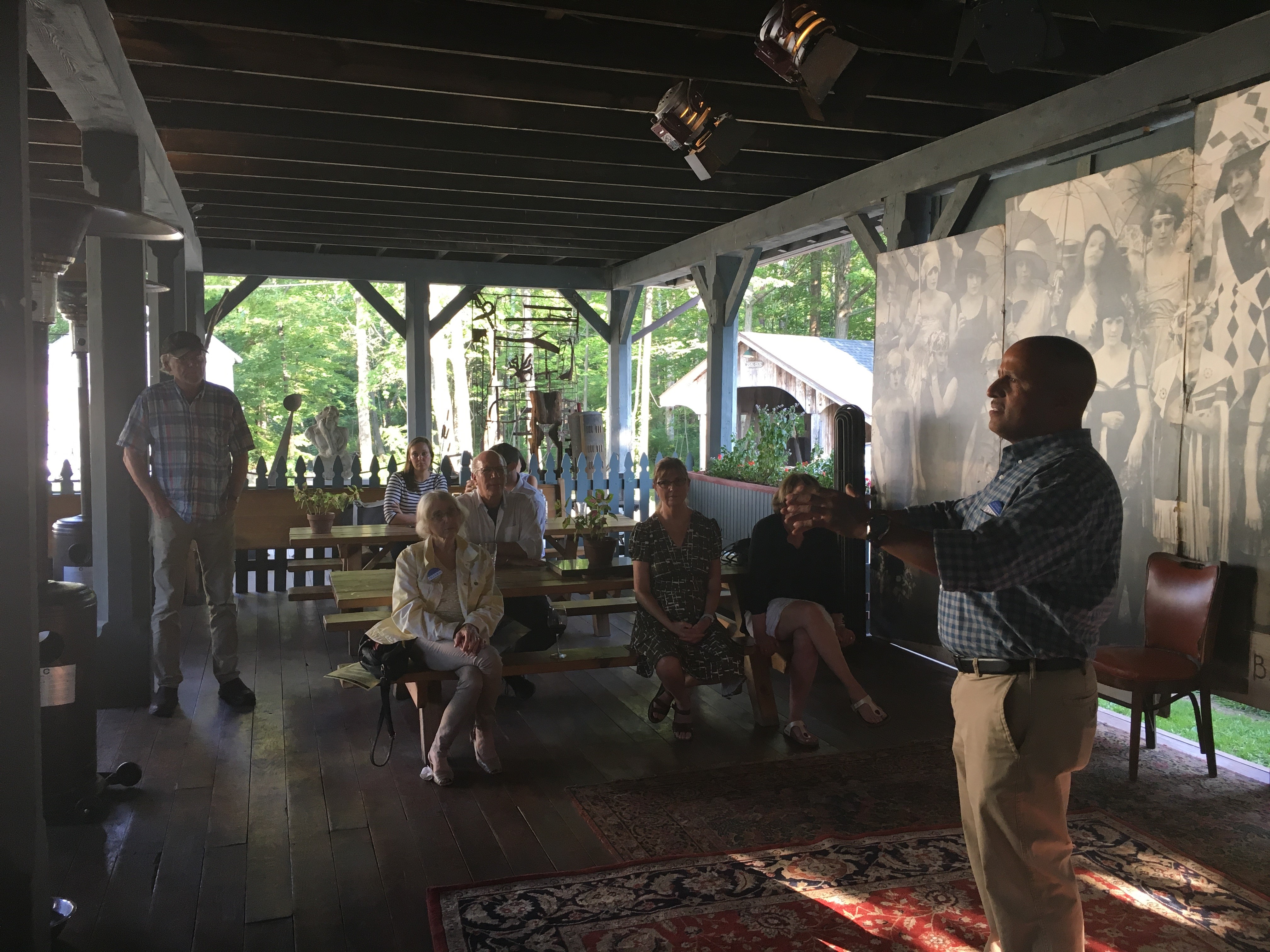 Juan Figueroa speaks to a crowd in Woodstock, NY. (CREDIT: Ryan Koronowsk)