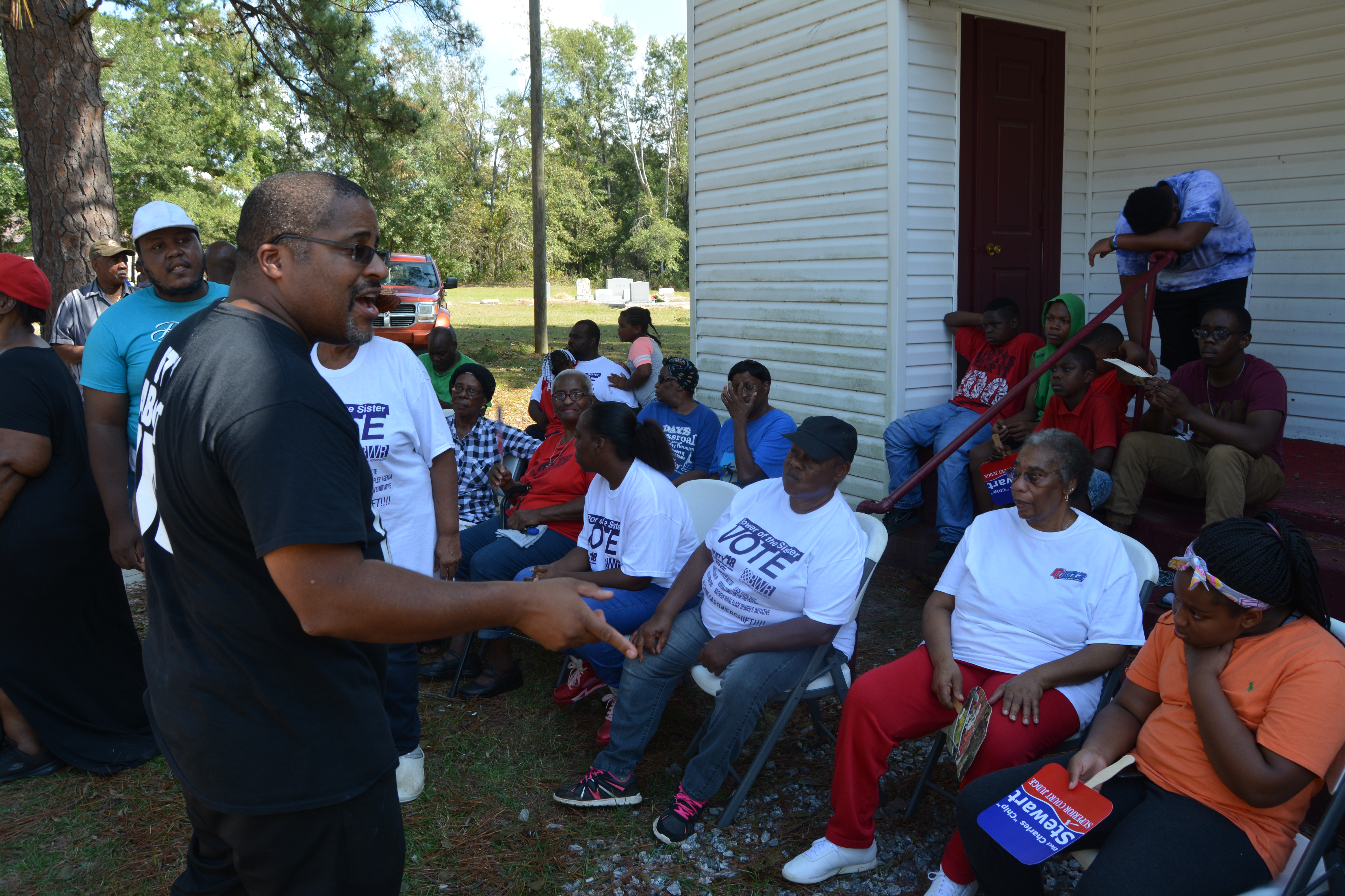 Cliff Albright talks to residents of Clay County, Georgia. Many of them lost power for days after Hurricane Michael. CREDIT: Kira Lerner