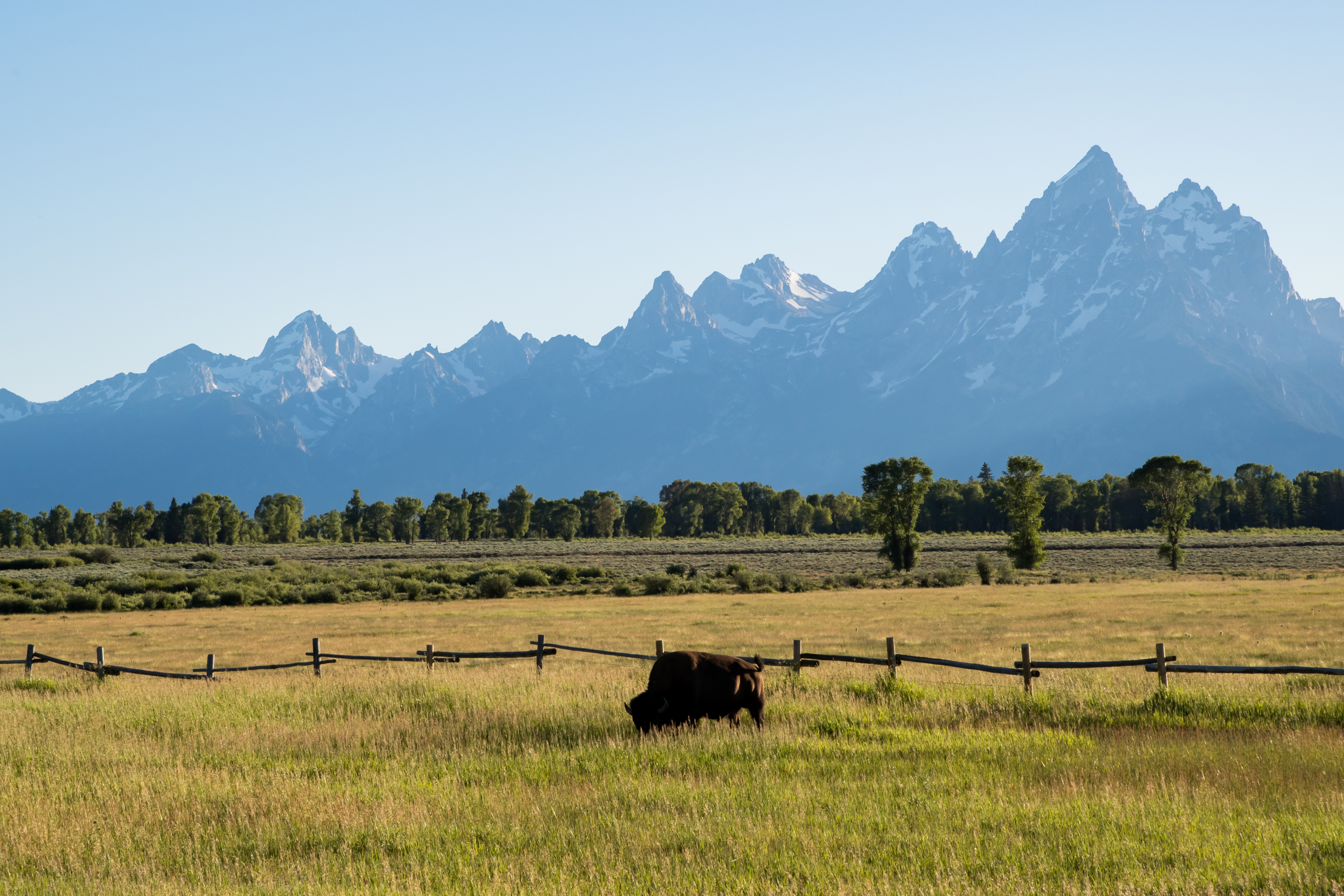 The Teton Range, a mountain range of the Rocky Mountains, is seen from Jackson Hole, Wyoming, United States on July 12, 2018. CREDIT: Patrick Gorski/NurPhoto via Getty Images