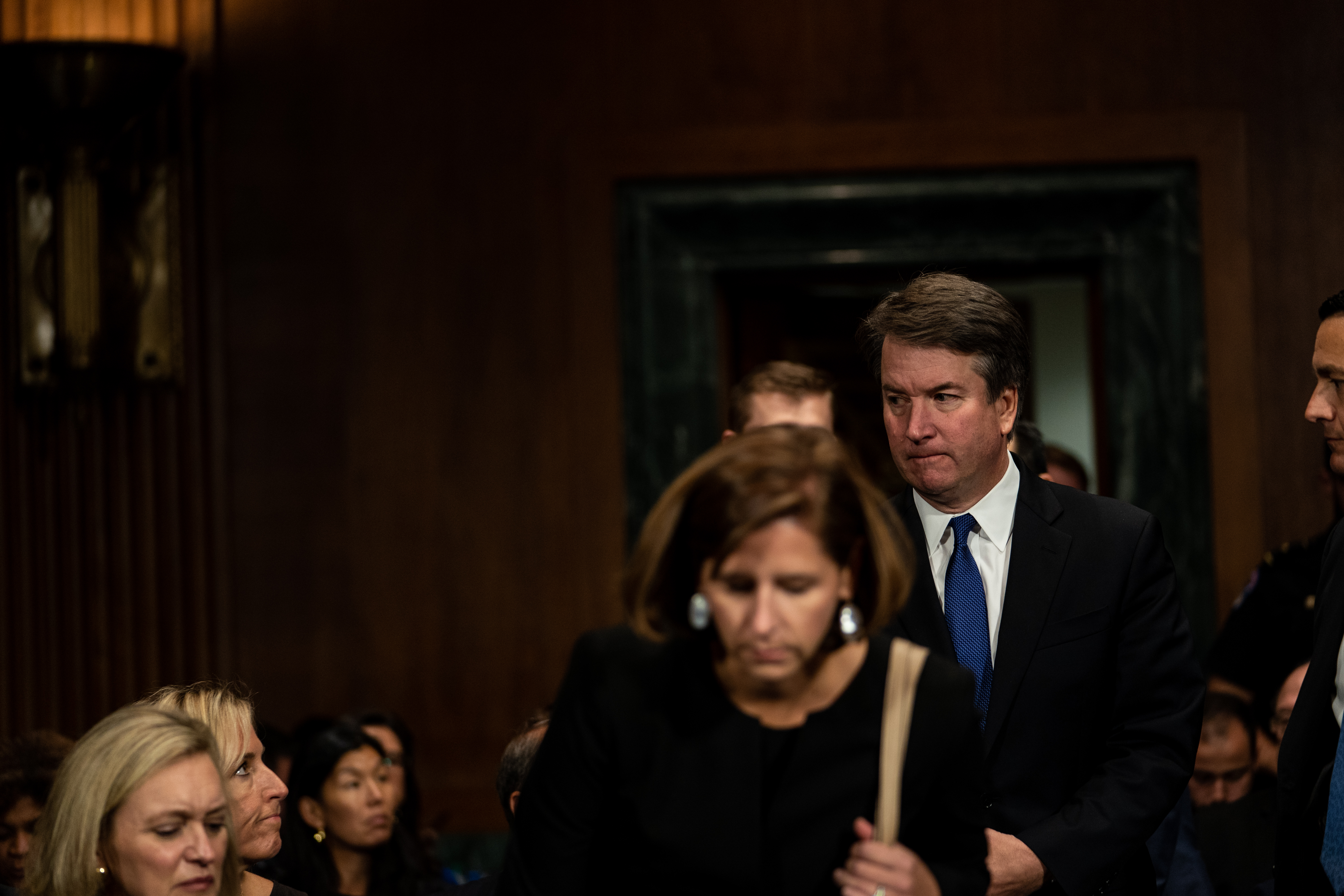 Former classmates of Brett Kavanaugh's have said the FBI probe into the sexual misconduct accusations against him is too restrictive. CREDIT: Erin Schaff-Pool/Getty Images