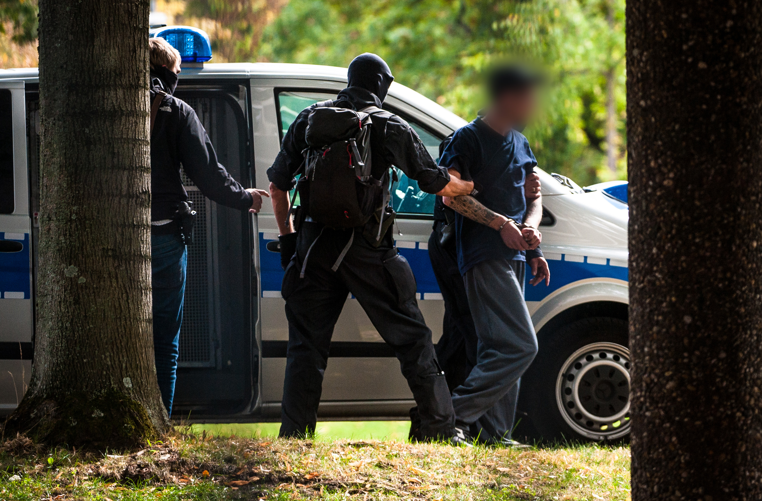 German police arrested six men on suspicion of belonging to a far-right "terrorist" group that attacked foreigners in the city of Chemnitz, eastern Germany. (Photo by Christoph Schmidt / dpa / AFP) / Germany OUT / GERMAN COURT REQUESTS THAT THE FACE OF THE SUSPECTED MUST BE MADE UNRECOGNISABLE (CREDIT: CHRISTOPH SCHMIDT/AFP/Getty Images)