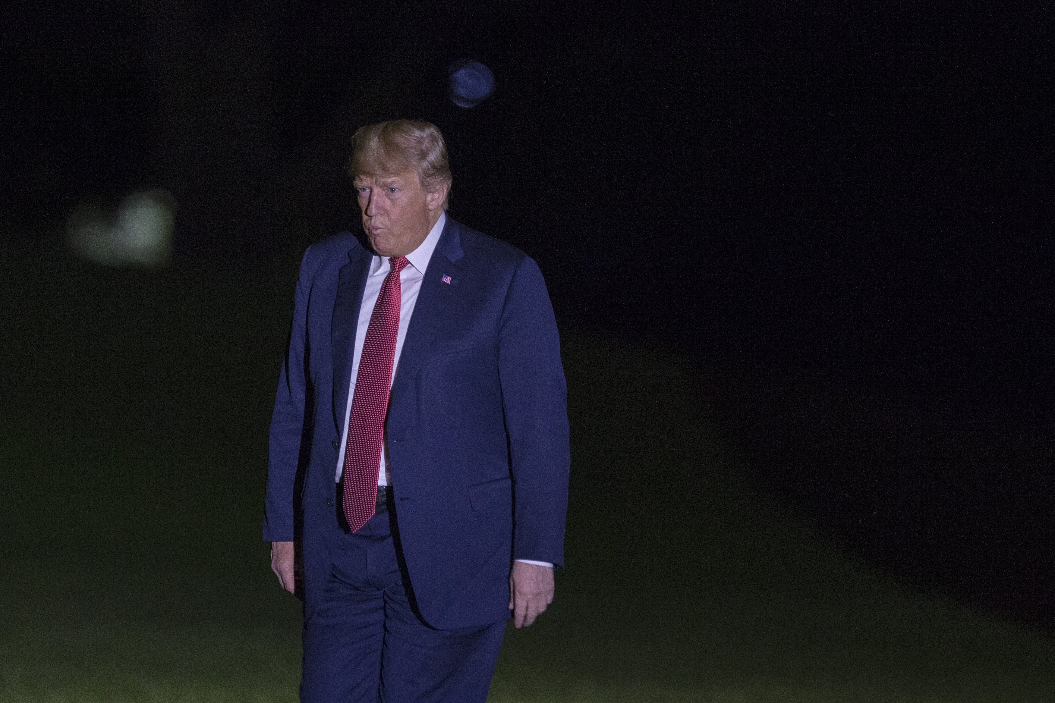 White supremacists have flocked to back Trump's latest claims about George Soros. CREDIT: POOL / GETTY