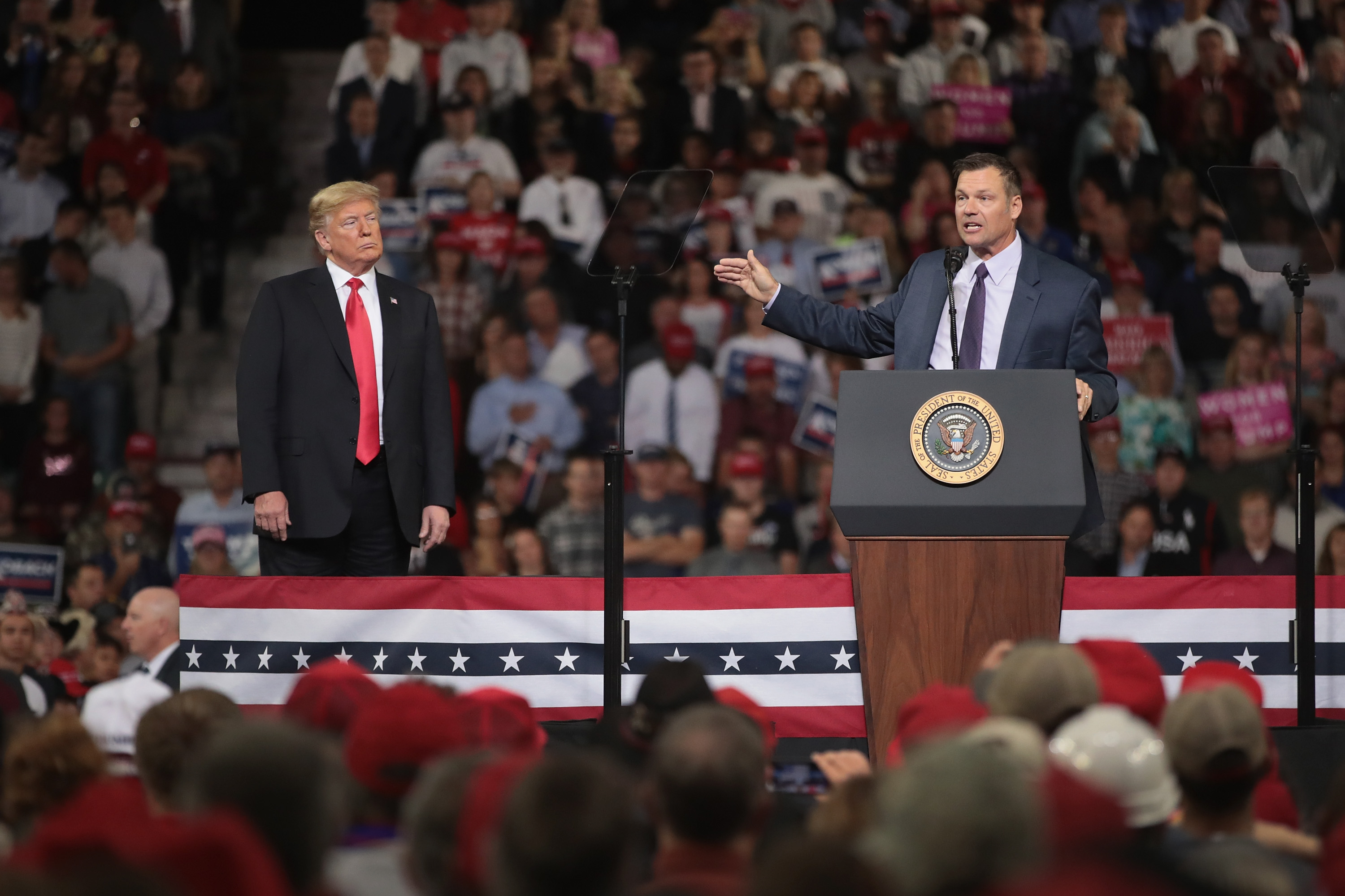 TOPEKA, KS - OCTOBER 06: Republican candidate for governor of Kansas Kris Kobach speaks at a rally with President Donald Trump at the Kansas Expocenter on October 6, 2018 in Topeka, Kansas. Trump scored a political victory today when Judge Brett Kavanaugh was confirmed by the Senate to become the next Supreme Court justice. (Photo by Scott Olson/Getty Images)