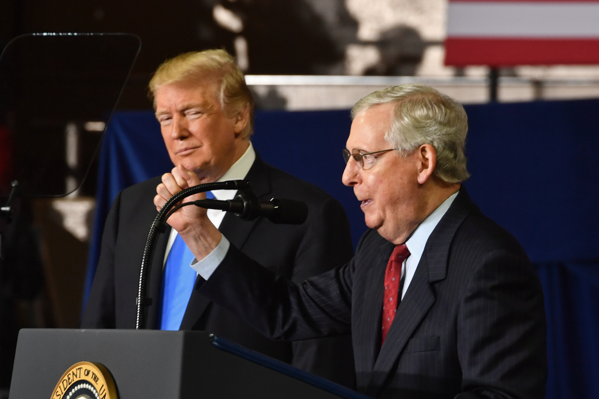 McConnell speaks as US President Donald Trump looks on during a rally in Richmond, Kentucky, on October 13, 2018. (CREDIT: NICHOLAS KAMM/AFP/Getty Images)
