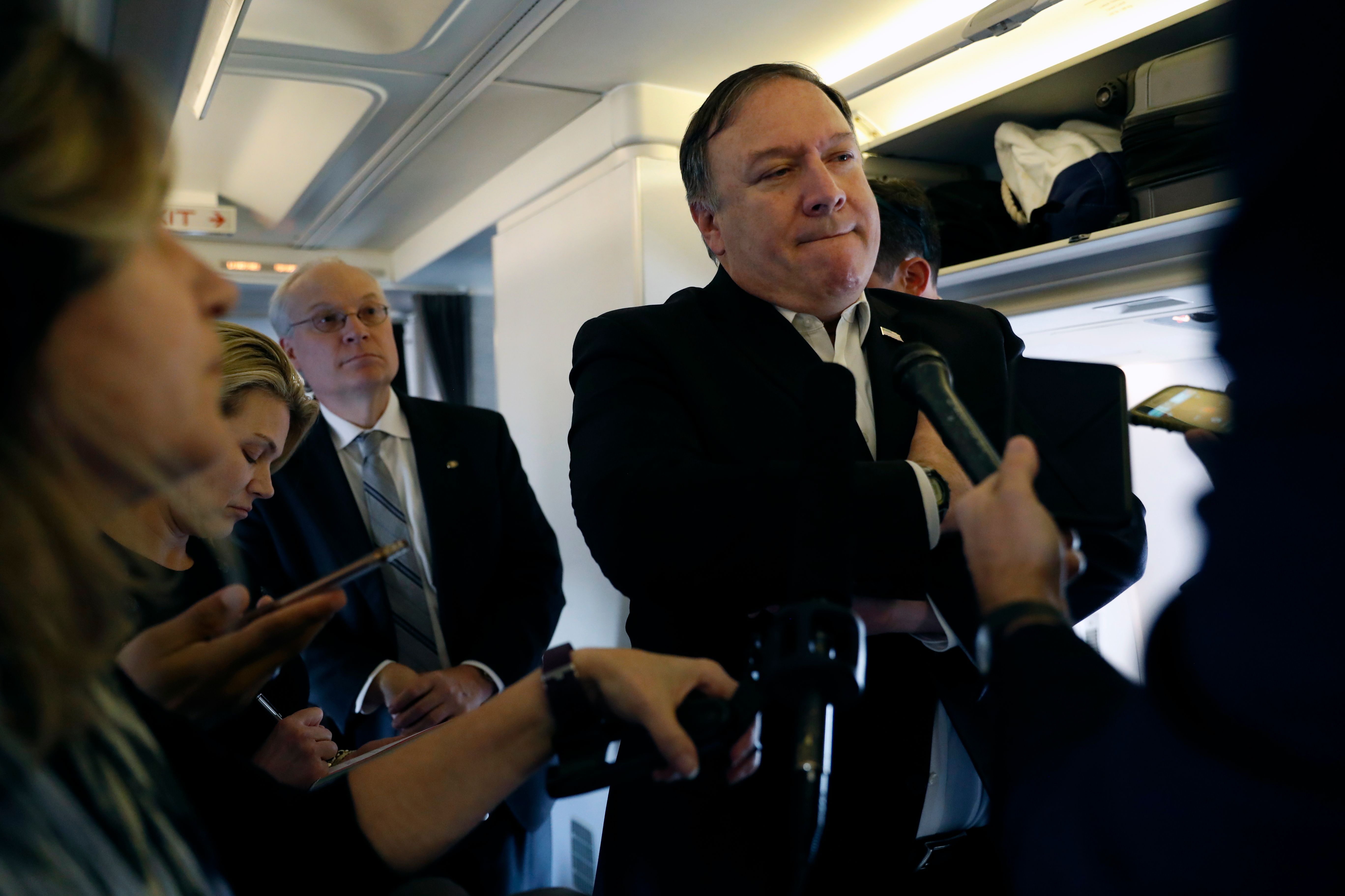 Secretary of State Mike Pompeo speaks to reporters while his plane refuels in Brussels, Belgium on October 17, 2018. CREDIT: Leah Millis/AFP/Getty Images.
