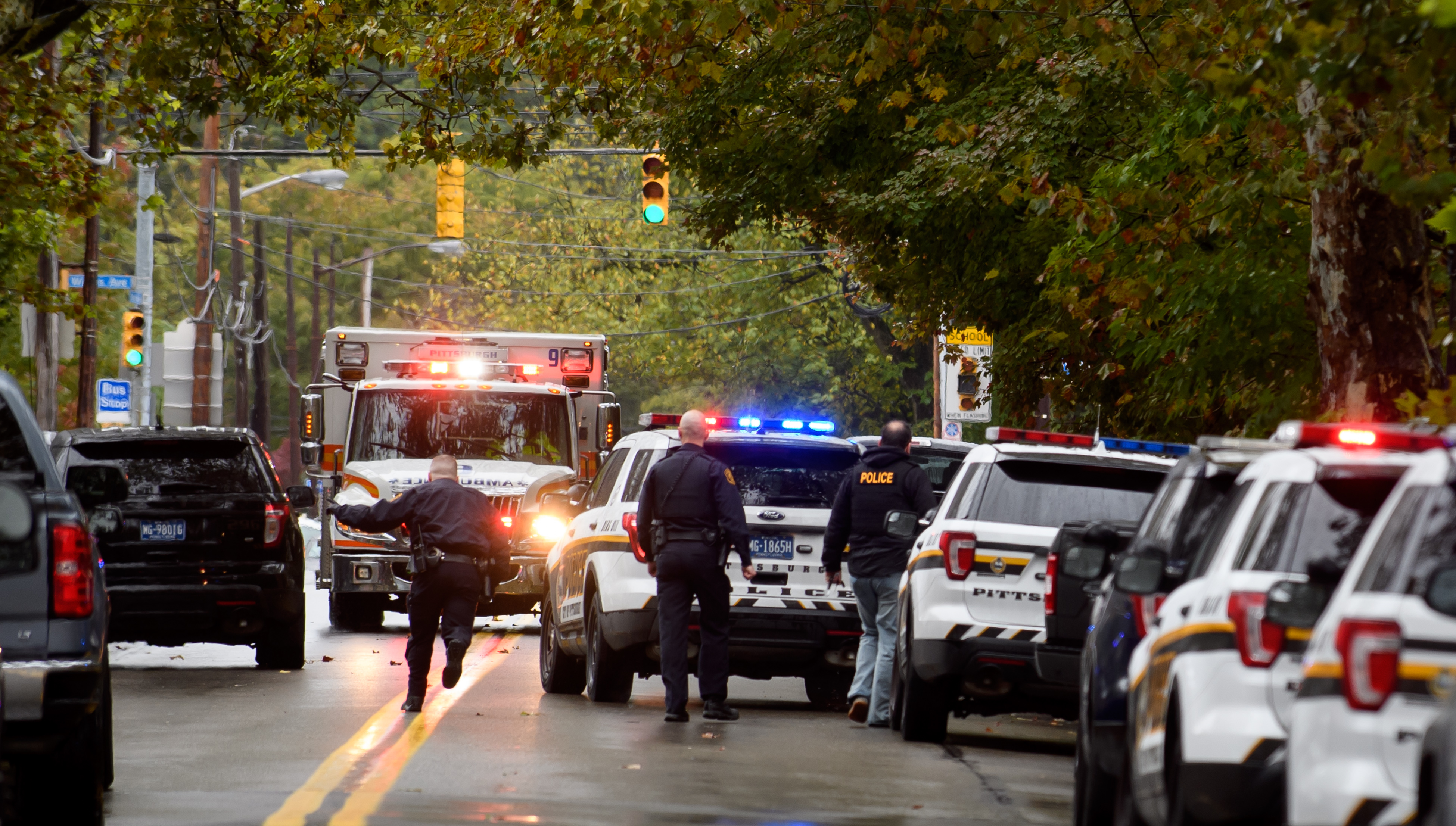 Police rapid response team members respond to the site of a mass shooting at the Tree of Life Synagogue in the Squirrel Hill neighborhood on October 27, 2018 in Pittsburgh, Pennsylvania. According to reports, at least 12 people were shot, multiple killed, and several police officers hurt during the incident. The shooter surrendered to authorities and was taken into custody. (Photo credit: Jeff Swensen/Getty Images)